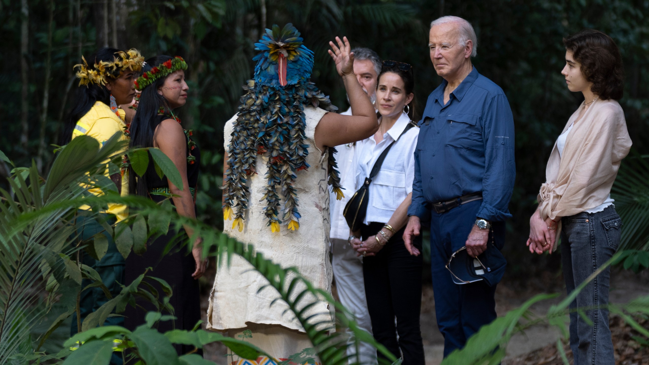 President Joe Biden, second right, joined by daughter Ashley Biden, third from right, and granddaughter Natalie Biden, right, meets with indigenous and other leaders during a tour of the Museu da Amazonia in Manaus, Brazil, Sunday, Nov. 17, 2024. (AP Photo/Manuel Balce Ceneta)