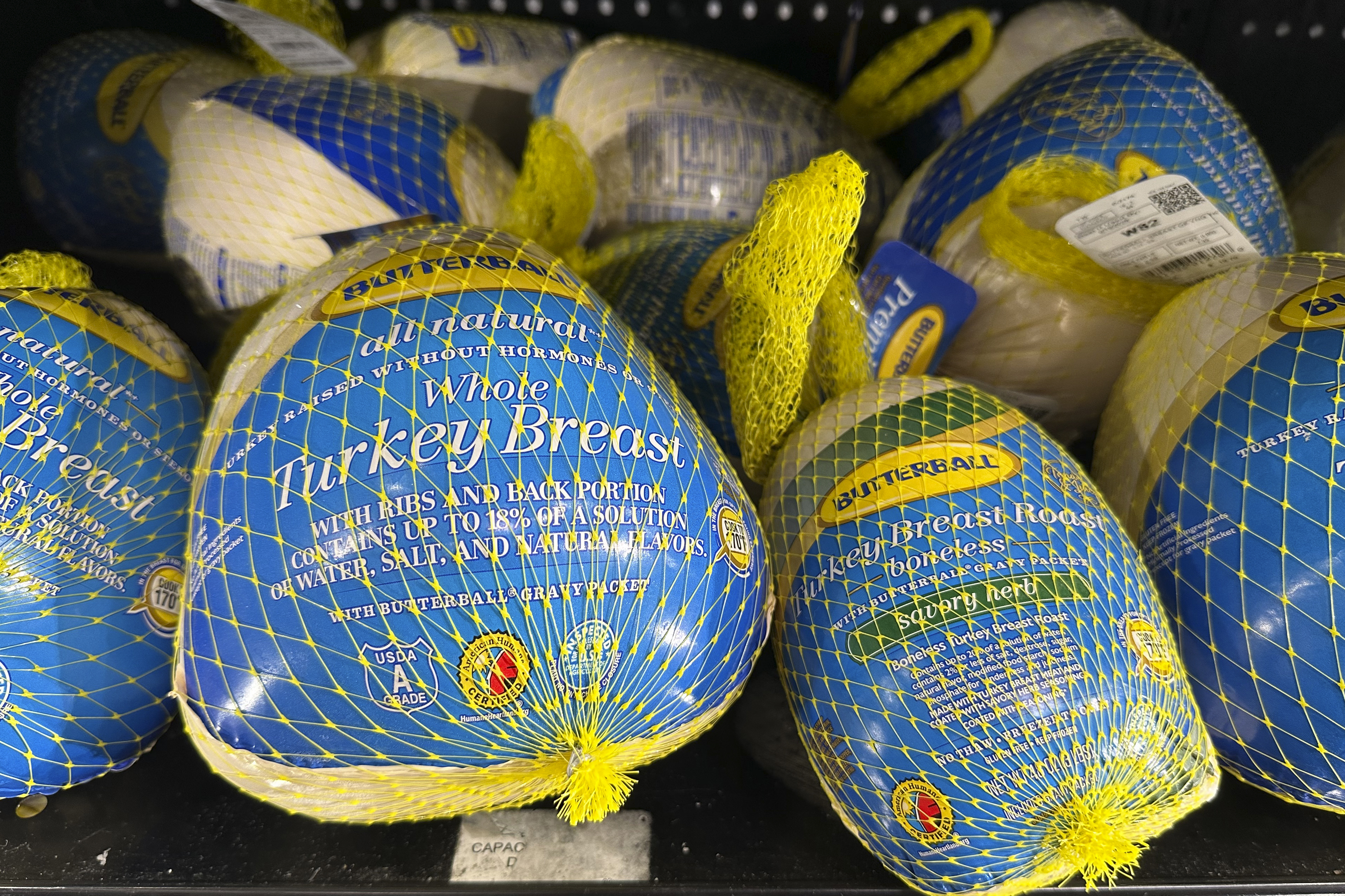 Frozen whole turkey breast is displayed at a Walmart store in Milford, Conn., on Saturday, Nov. 16, 2024. (AP Photo/Peter Morgan)