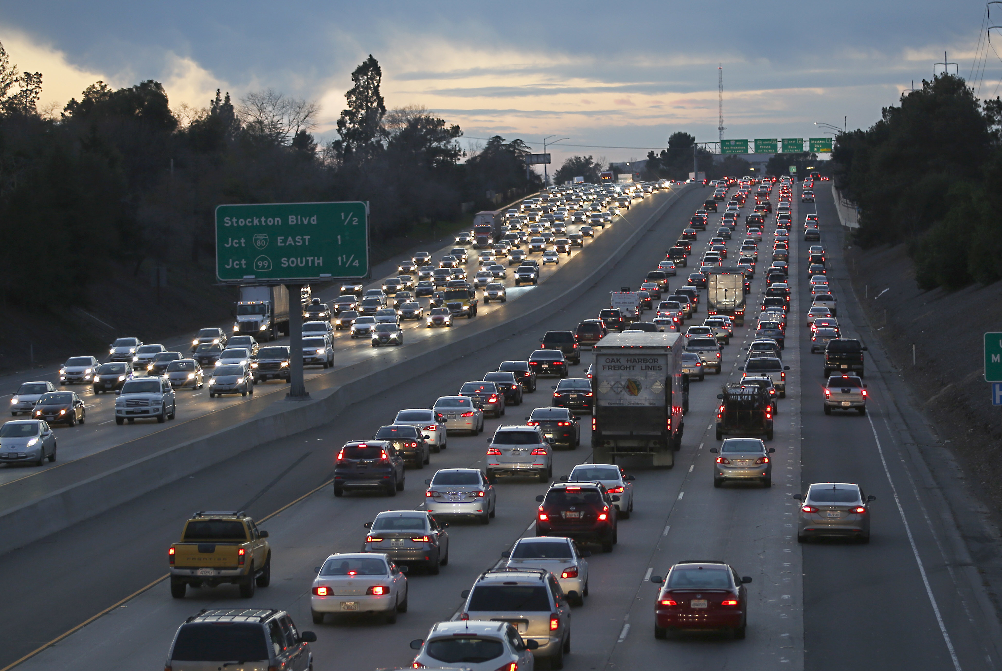 FILE - Evening rush hour traffic fills Highway 50, Jan. 26, 2017, in Sacramento, Calif. (AP Photo/Rich Pedroncelli, File)