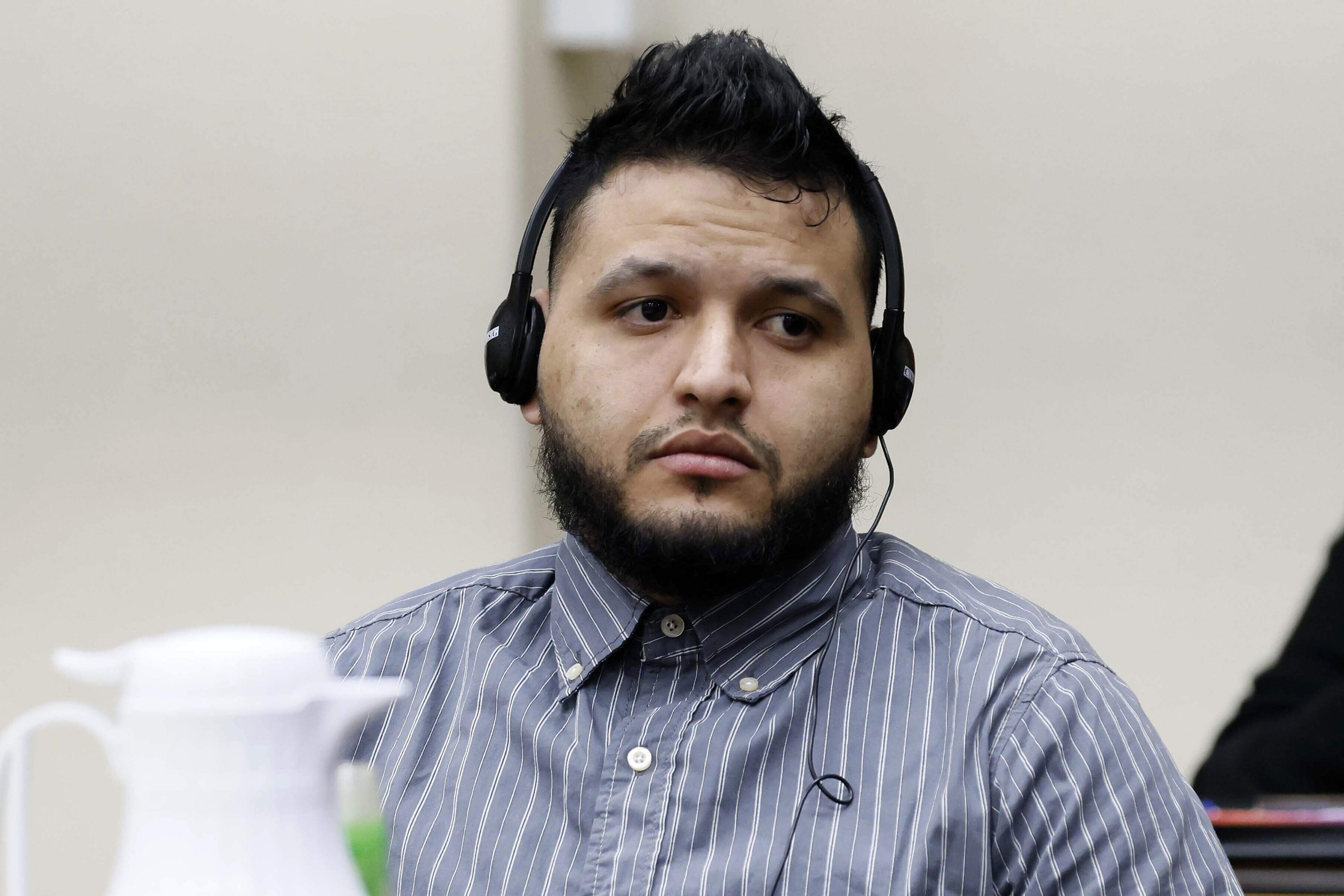 Jose Ibarra listens through an interpreter during the second day of his trial at the Athens-Clarke County Superior Court on Monday, Nov. 18, 2024, in Athens, Ga. (Miguel Martinez/Atlanta Journal-Constitution via AP, Pool)