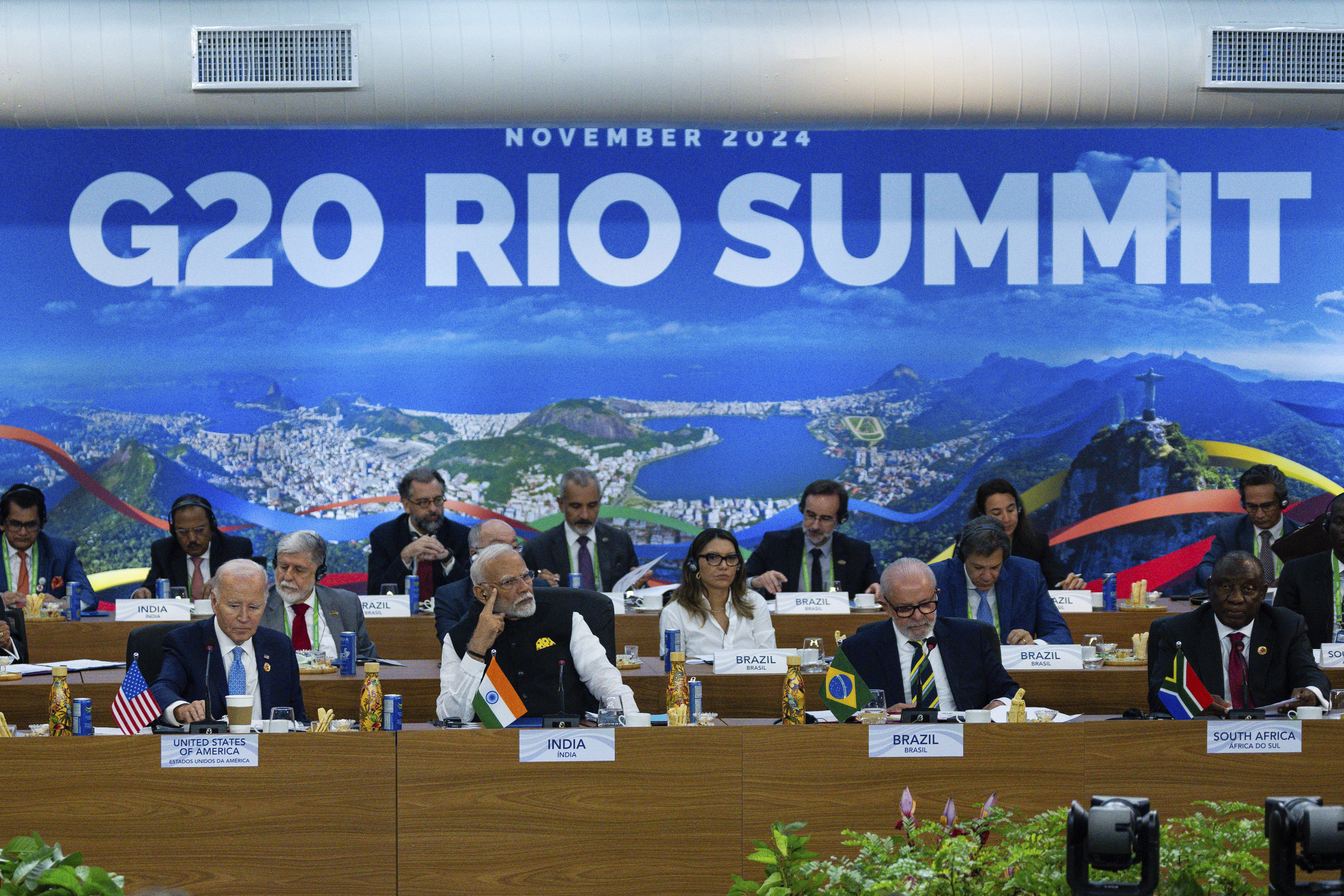 President Joe Biden, from front left, Indian's Prime Minister Narendra Modi, Brazil's President Luis Inacio Lula da Silva, South Africa's President Cyril Ramaphosa and other G20 leaders listen during the G20 Summit at the Museum of Modern Art in Rio de Janeiro, Monday, Nov. 18, 2024. (Eric Lee/The New York Times via AP, Pool)