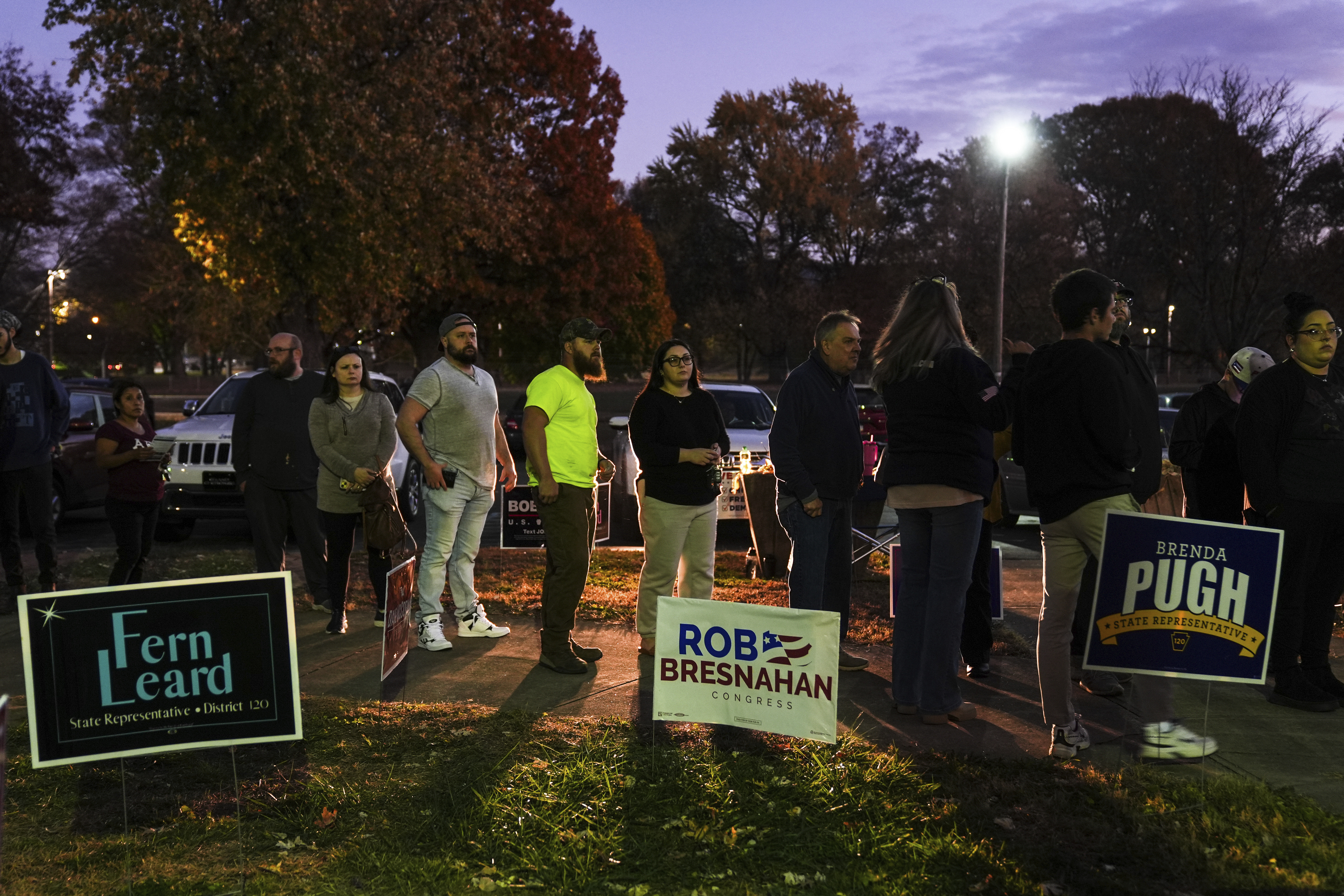 Voters wait in line to cast their ballots at the Kingston Armory in Wilkes-Barre, Pa, Tuesday, Nov. 5, 2024. (AP Photo/Matt Rourke)