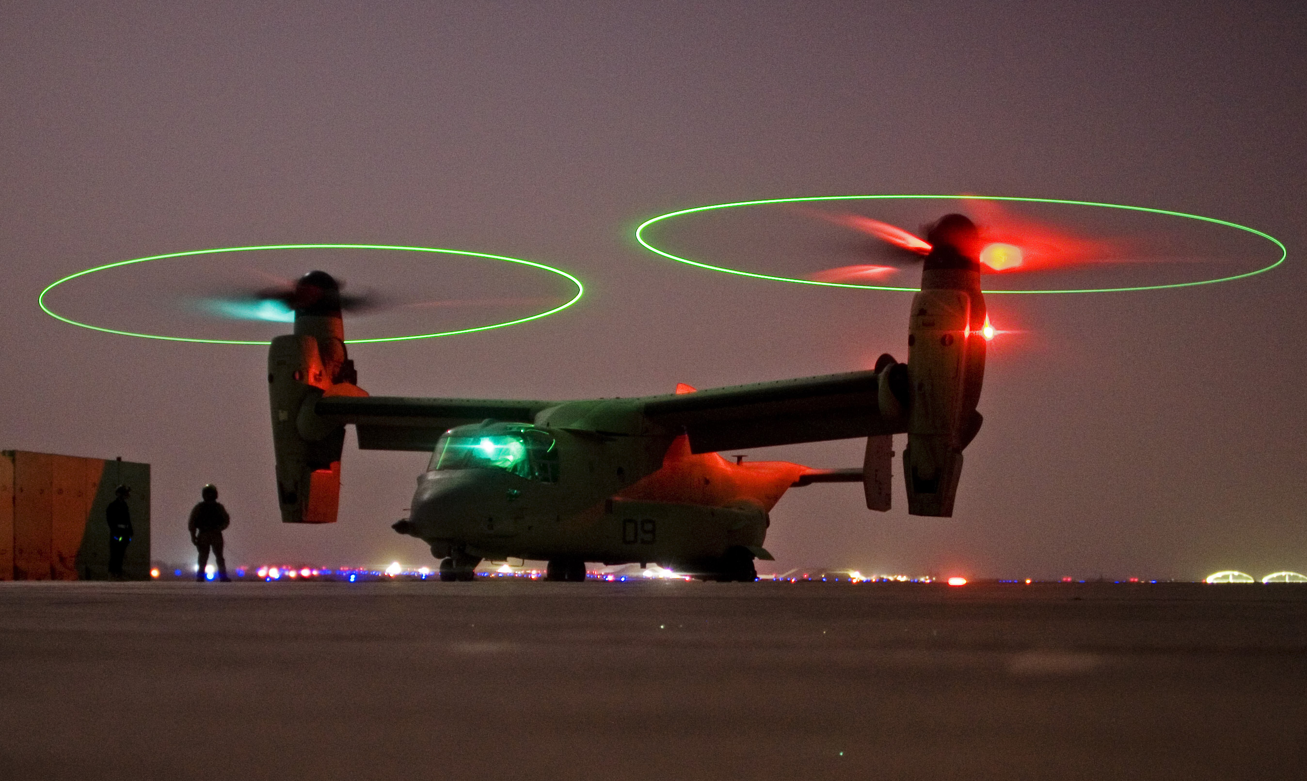 FILE - A V-22 Osprey tilt rotor aircraft taxi's during a mission in western Iraqi desert, Oct. 13, 2008. (AP Photo/Dusan Vranic, File)