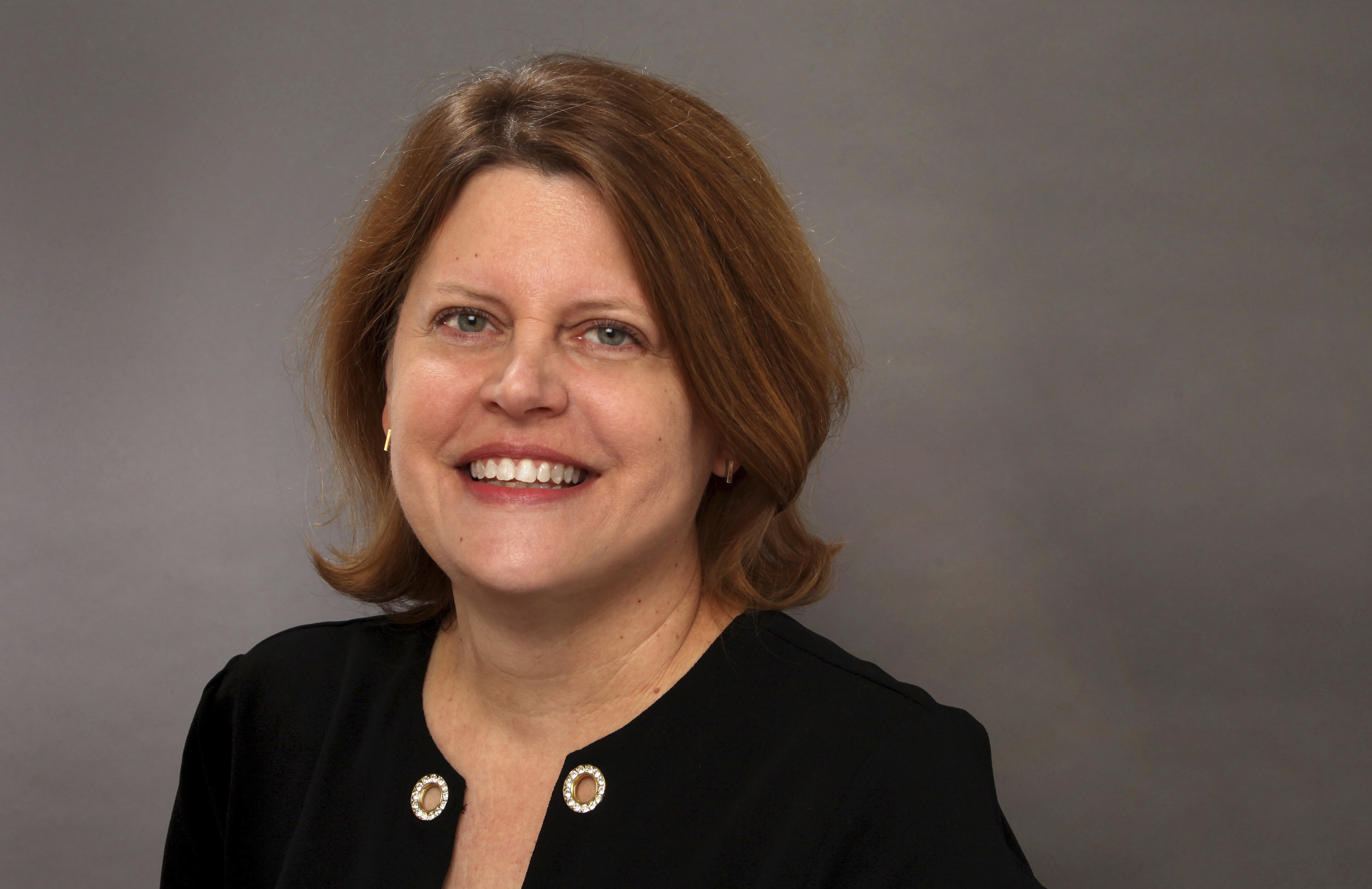 FILE - Sally Buzbee, then-senior vice president and executive editor of The Associated Press, poses for a photo, Dec. 13, 2018, in New York. (AP Photo/Chuck Zoeller, File)