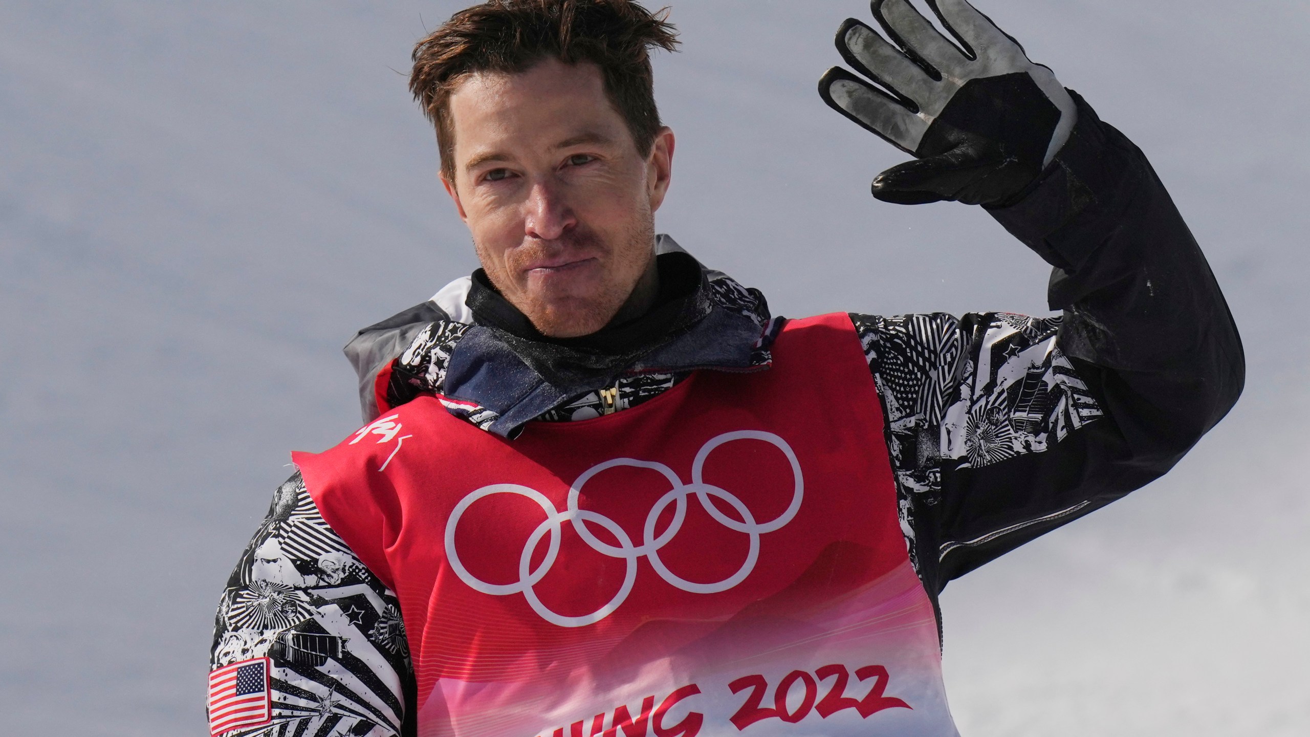 FILE - Shaun White waves after competing in the men's halfpipe finals at the 2022 Winter Olympics, Friday, Feb. 11, 2022, in Zhangjiakou, China. (AP Photo/Francisco Seco, File)