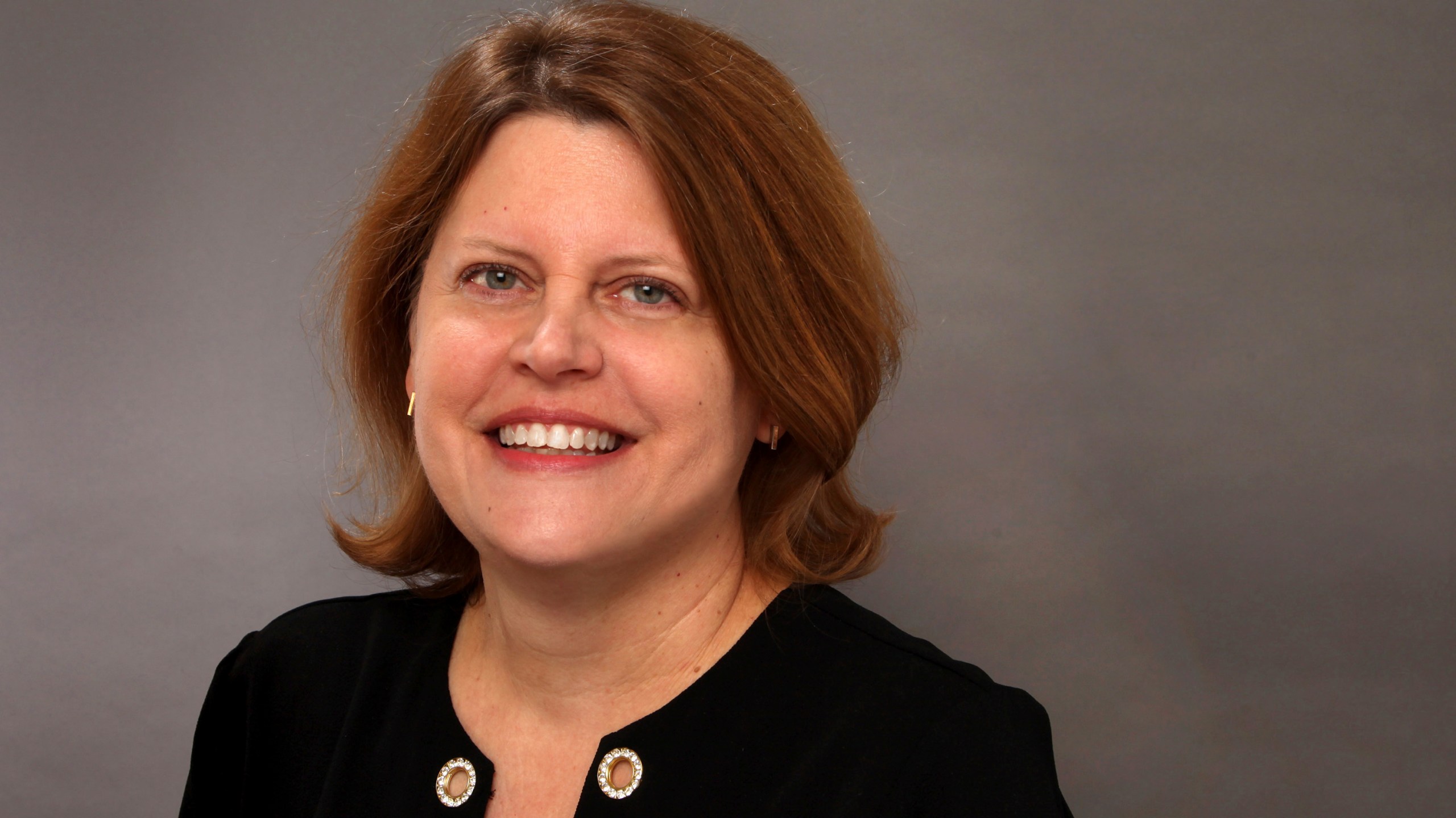 FILE - Sally Buzbee, then-senior vice president and executive editor of The Associated Press, poses for a photo, Dec. 13, 2018, in New York. (AP Photo/Chuck Zoeller, File)