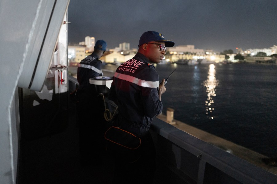 Senegalese sailors on the patrol vessel Niani attend a mission to search for migrant boats near the coast of Dakar, Senegal, Saturday, Nov.16, 2024. (AP Photo/Sylvain Cherkaoui)