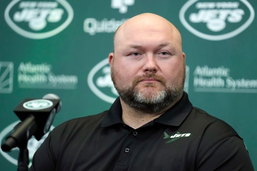 FILE - New York Jets general manager Joe Douglas listens during a news conference at the team's NFL football training facility in Florham Park, N.J., Wednesday, April 26, 2023. (AP Photo/Seth Wenig, File)