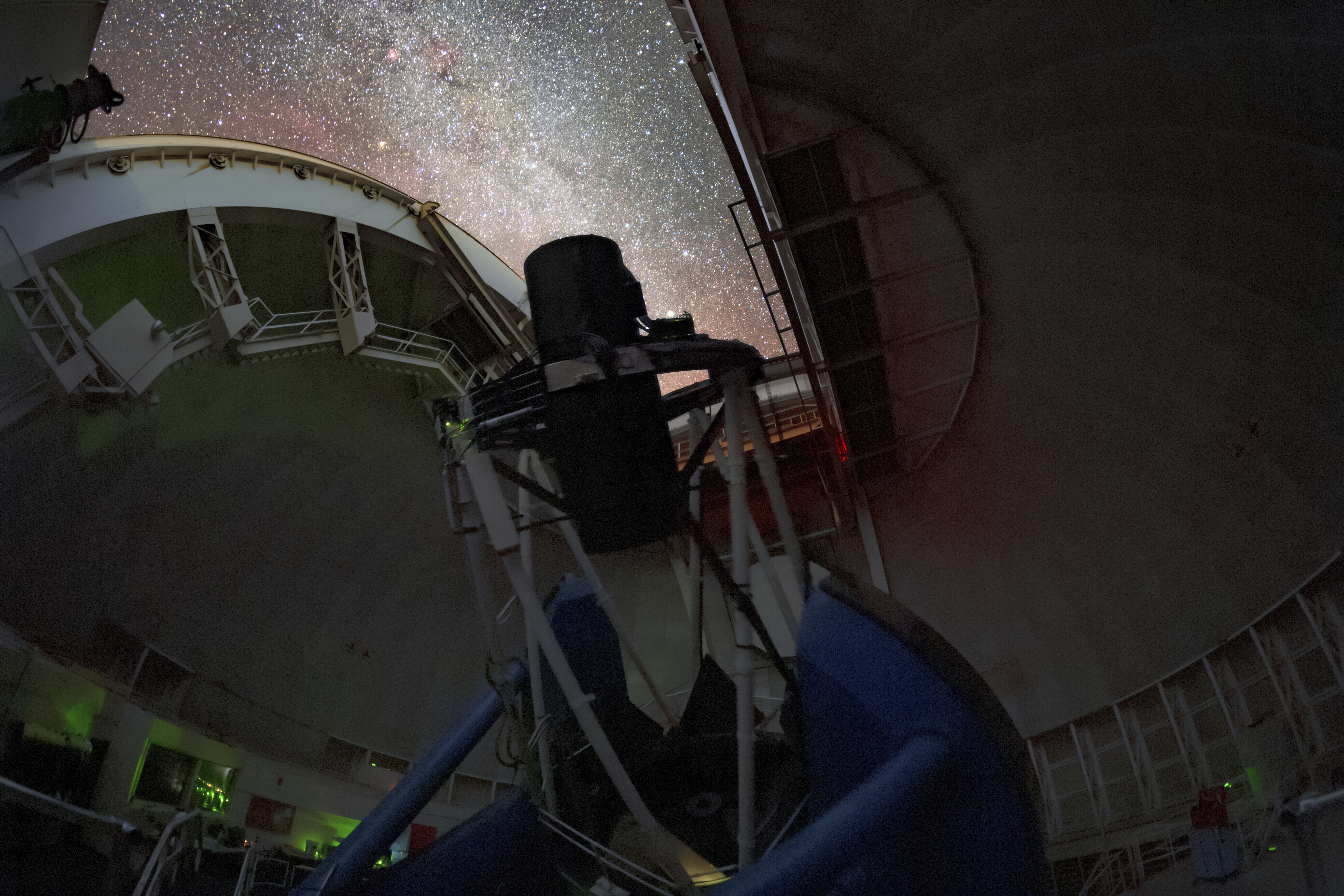 The Dark Energy Spectroscopic Instrument (DESI) making observations in the night sky on the Nicholas U. Mayall 4-meter Telescope at Kitt Peak National Observatory in Tucson, Ariz. (Peter Toman Tomas Slovinsky/NSF's NOIRLab via AP)