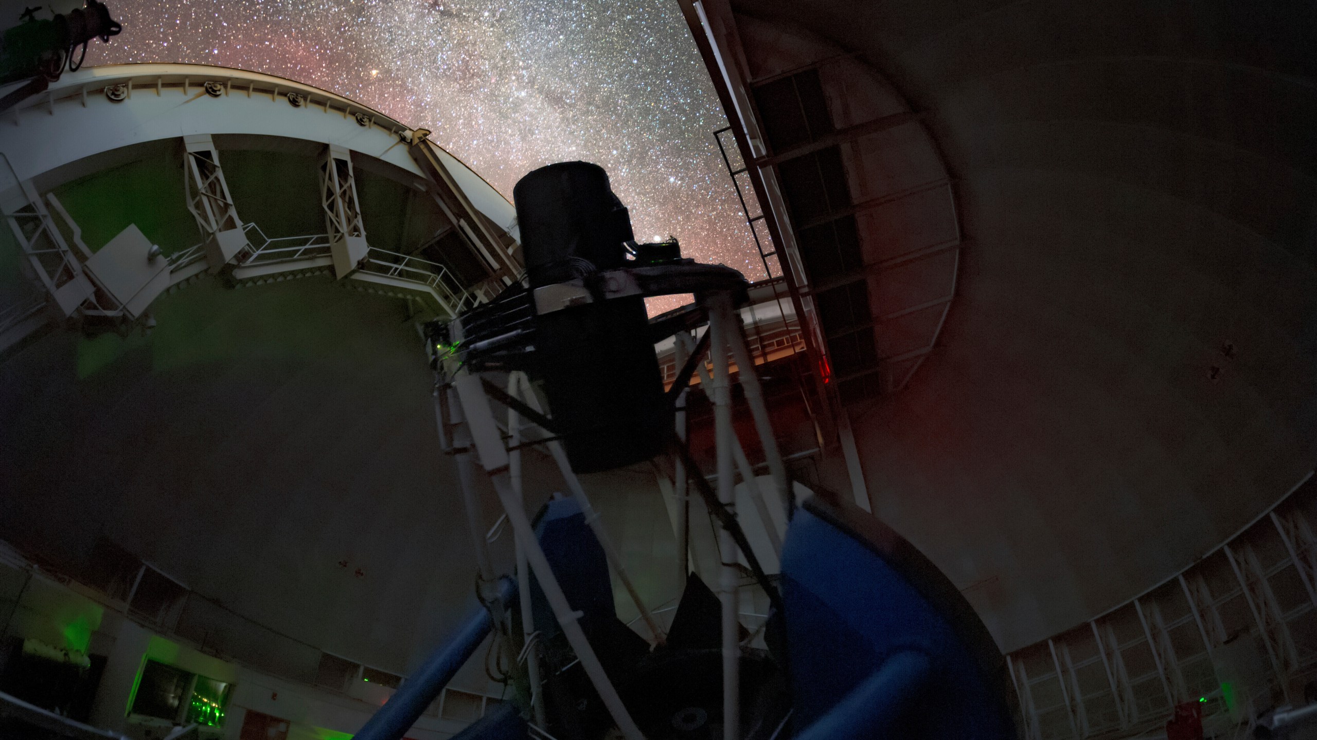 The Dark Energy Spectroscopic Instrument (DESI) making observations in the night sky on the Nicholas U. Mayall 4-meter Telescope at Kitt Peak National Observatory in Tucson, Ariz. (Peter Toman Tomas Slovinsky/NSF's NOIRLab via AP)