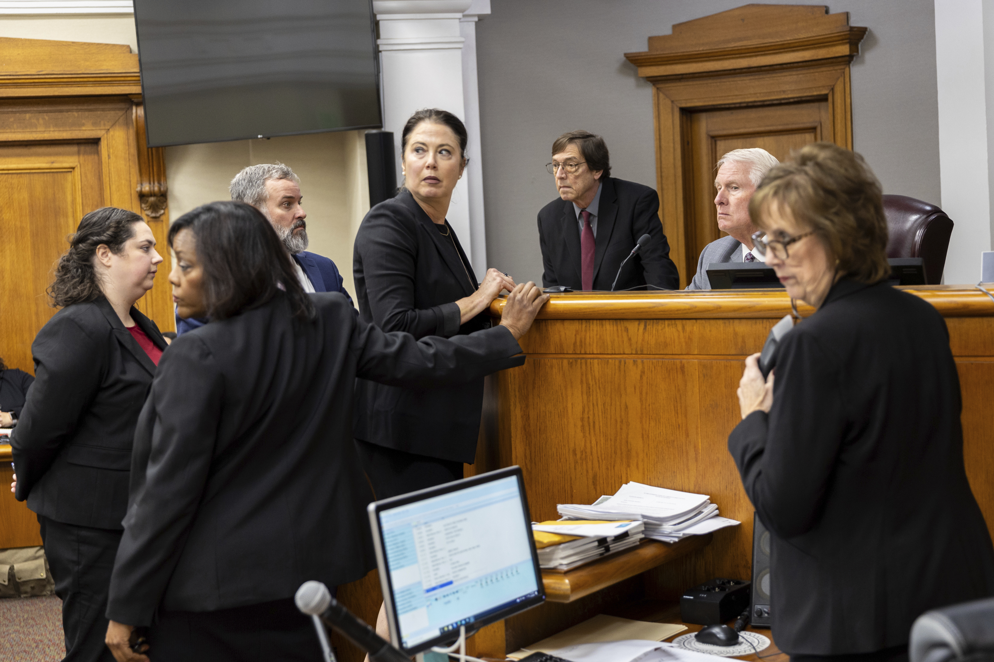 Prosecutors and defense meet with Judge H. Patrick Haggard during Jose Ibarra's trial at the Athens-Clarke County Superior Court, Tuesday, Nov. 19, 2024, in Athens, Ga. (Arvin Temkar/Atlanta Journal-Constitution via AP, Pool)