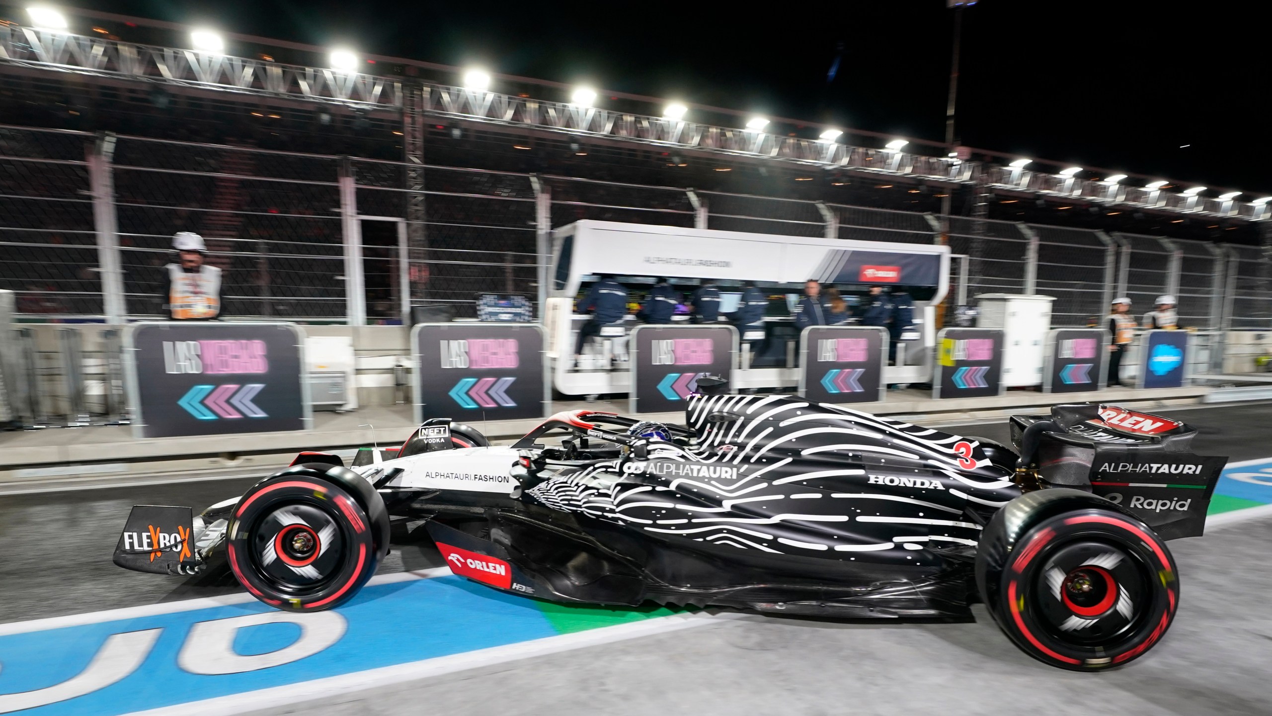 FILE - AlphaTauri driver Daniel Ricciardo, of Australia, leaves the garage during the final practice session for the Formula One Las Vegas Grand Prix auto race, Friday, Nov. 17, 2023, in Las Vegas. (AP Photo/Darron Cummings, File)