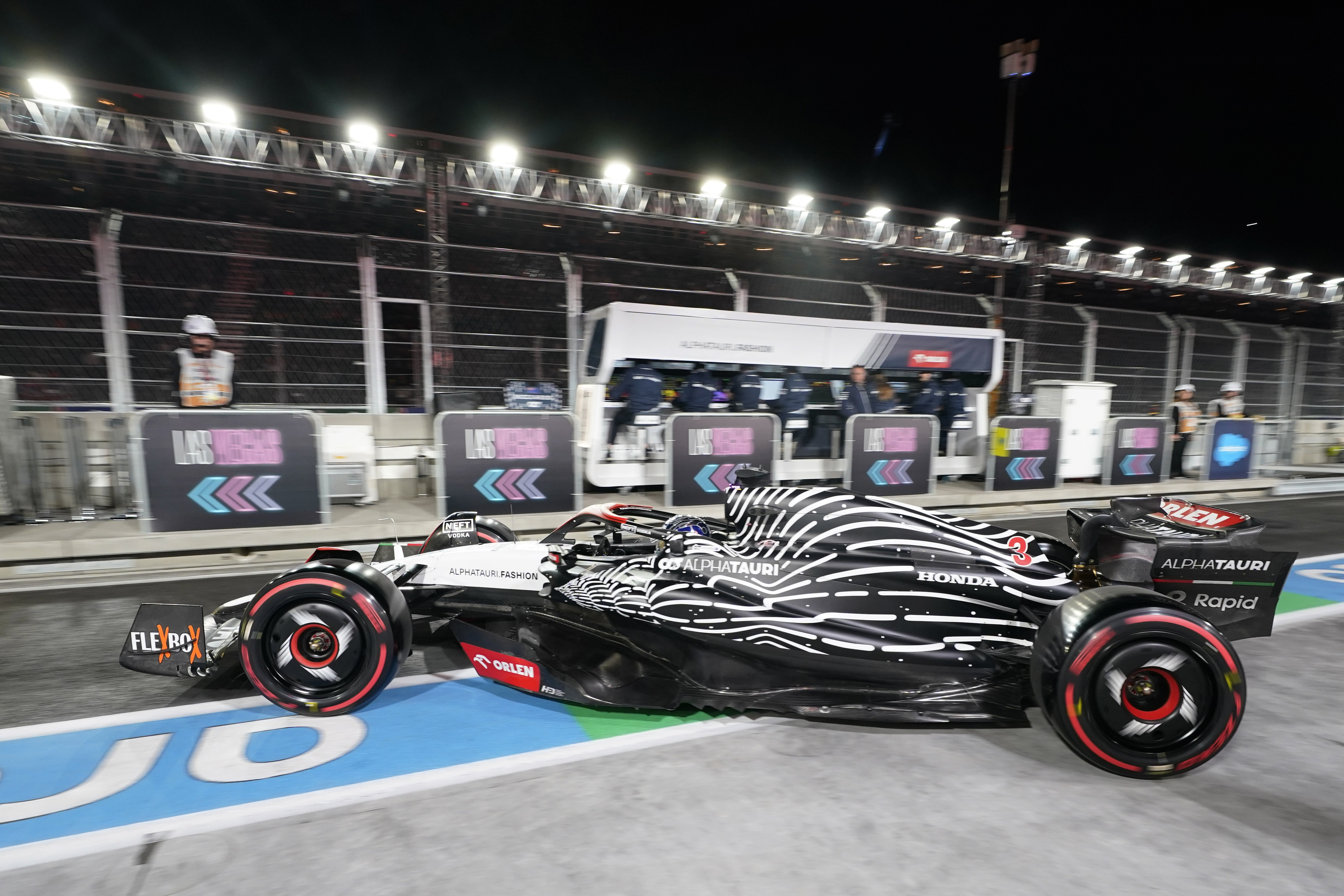 FILE - AlphaTauri driver Daniel Ricciardo, of Australia, leaves the garage during the final practice session for the Formula One Las Vegas Grand Prix auto race, Friday, Nov. 17, 2023, in Las Vegas. (AP Photo/Darron Cummings, File)