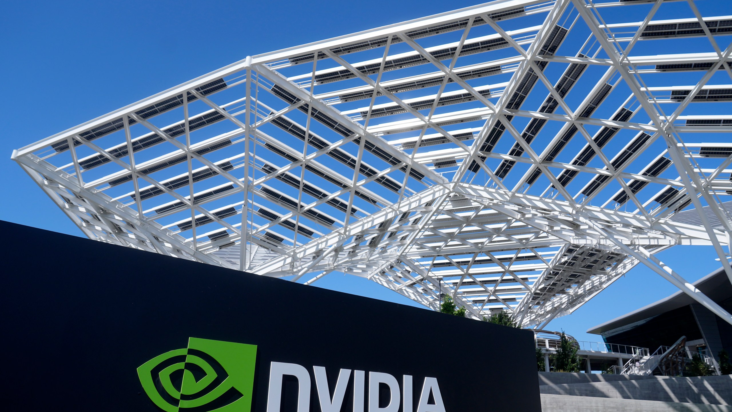 FILE - A sign to a Nvidia office building is shown in Santa Clara, Calif., on Aug. 7, 2024. (AP Photo/Jeff Chiu, File)