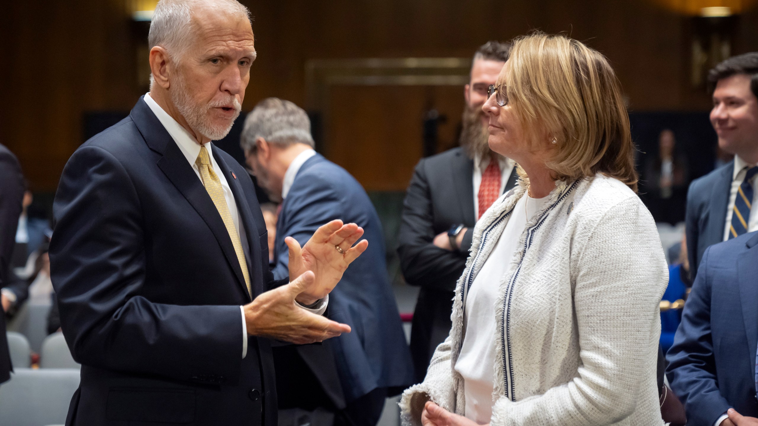 Sen. Thom Tillis, R-N.C., left, speaks with Federal Emergency Management Agency administrator Deanne Criswell before a hearing of the Senate Appropriations Committee on Capitol Hill, Wednesday, Nov. 20, 2024, in Washington. (AP Photo/Mark Schiefelbein)