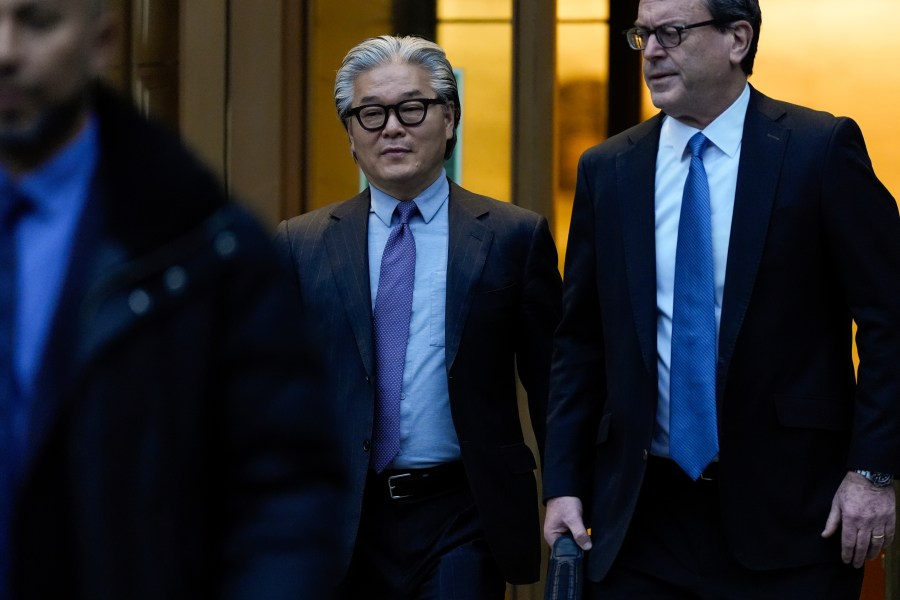 Bill Hwang, center, founder of Archegos Capital Management, departs federal court, Wednesday, Nov. 20, 2024, in New York. (AP Photo/Julia Demaree Nikhinson)