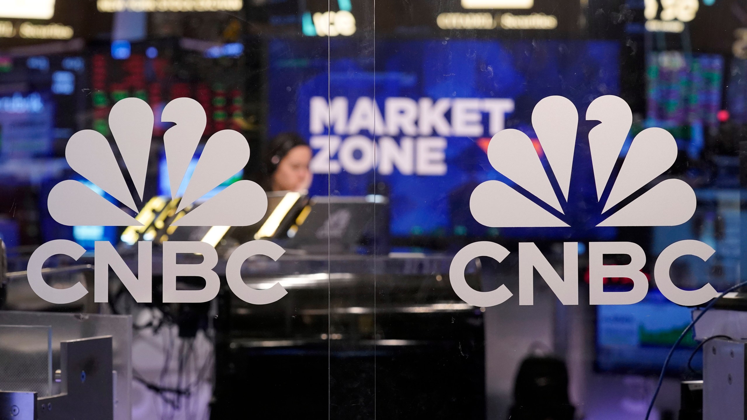 The logo for CNBC appears on the CNBC studio on the floor of the New York Stock Exchange, Wednesday, Nov. 20, 2024. (AP Photo/Richard Drew)