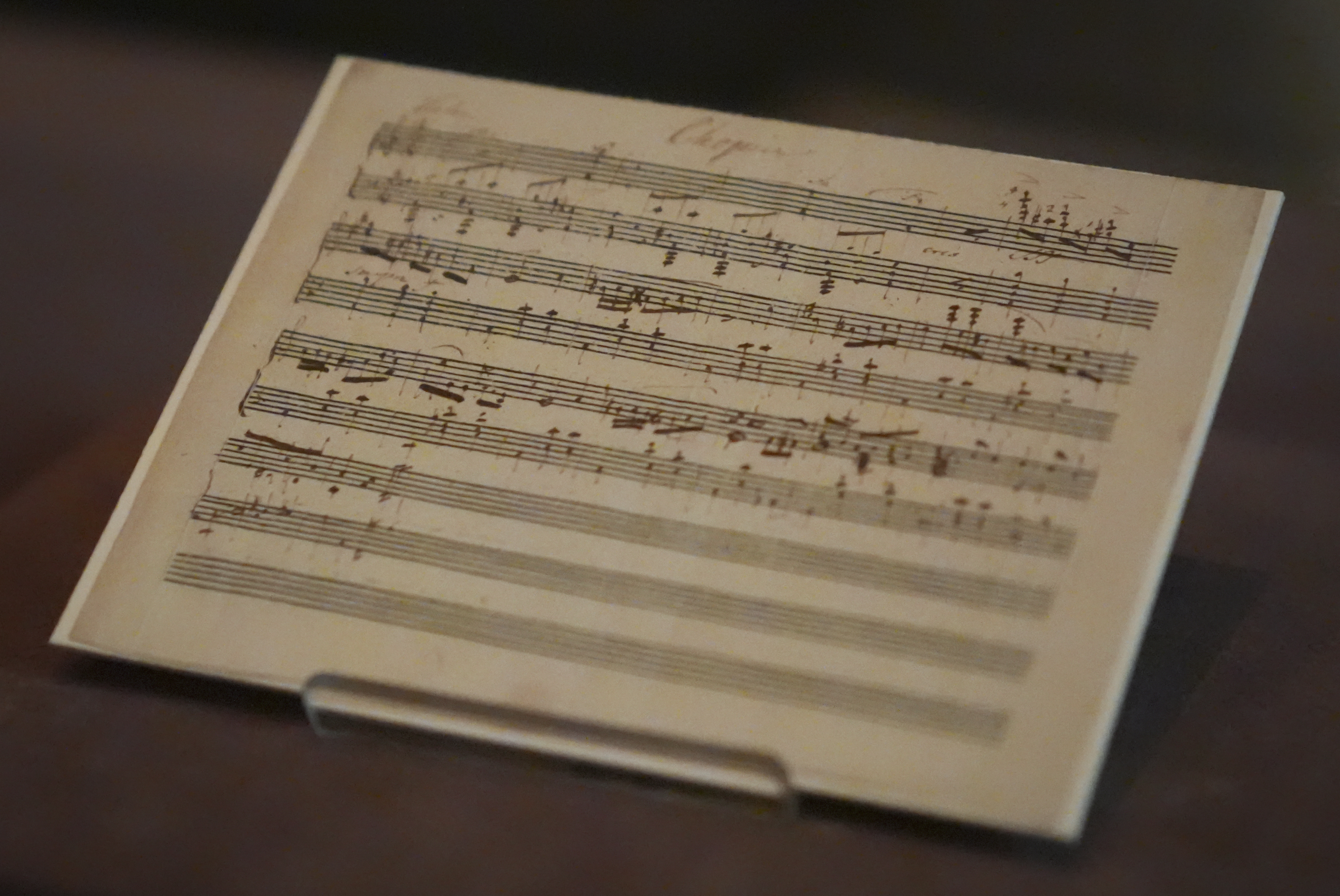 A previously unknown musical manuscript, possibly by Frederic Chopin, rests in a display case after it was discovered at The Morgan Library & Museum, Wednesday, Nov. 13, 2024, in New York. It's discovery marks the first such find since 1930, though its authenticity remains debated. (AP Photo/John Minchillo)