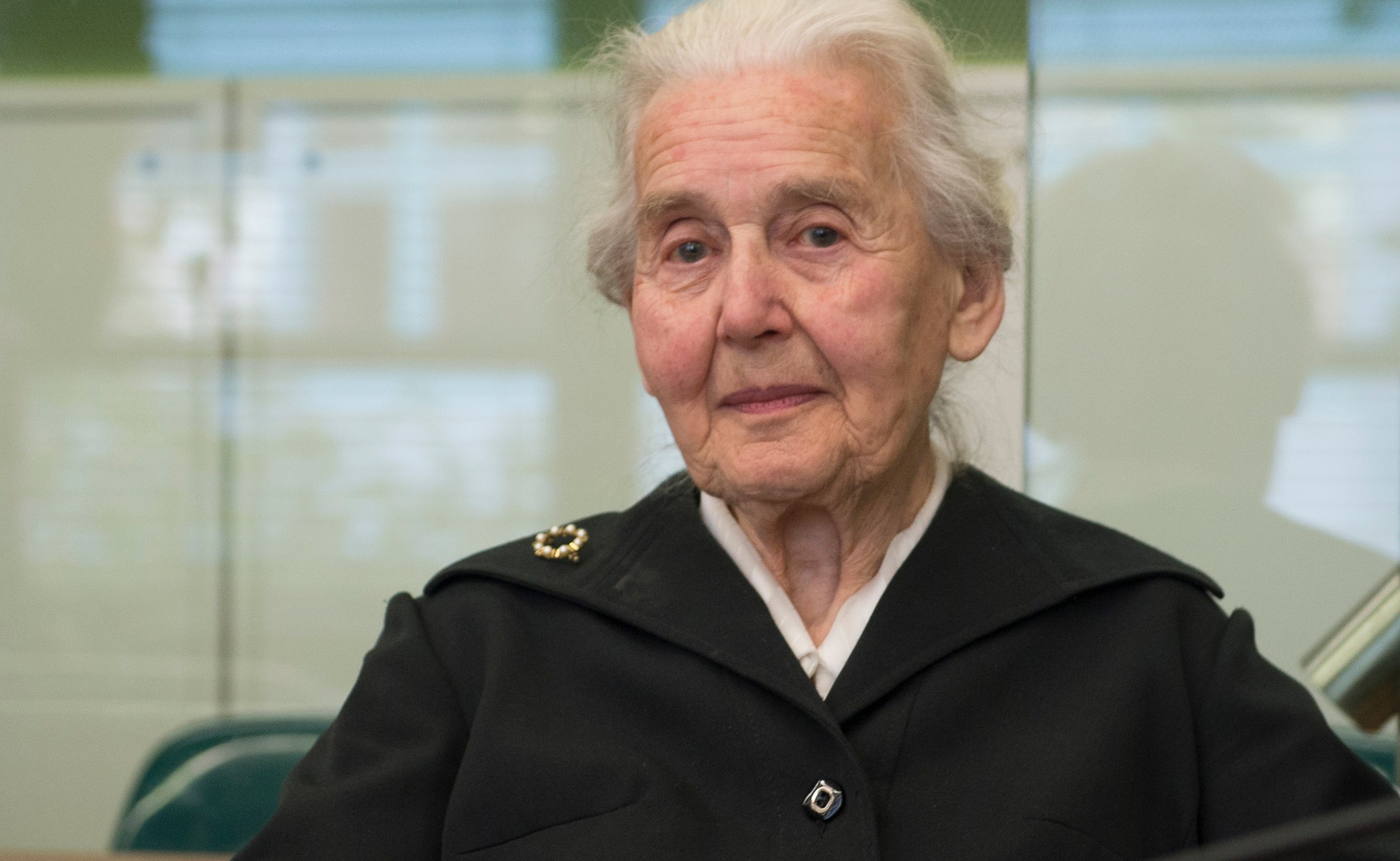 FILE -Ursula Haverbeck arrives in the Tiergarten District Court in Berlin, Germany, Oct. 16, 2017. (Paul Zinken/dpa via AP, File)