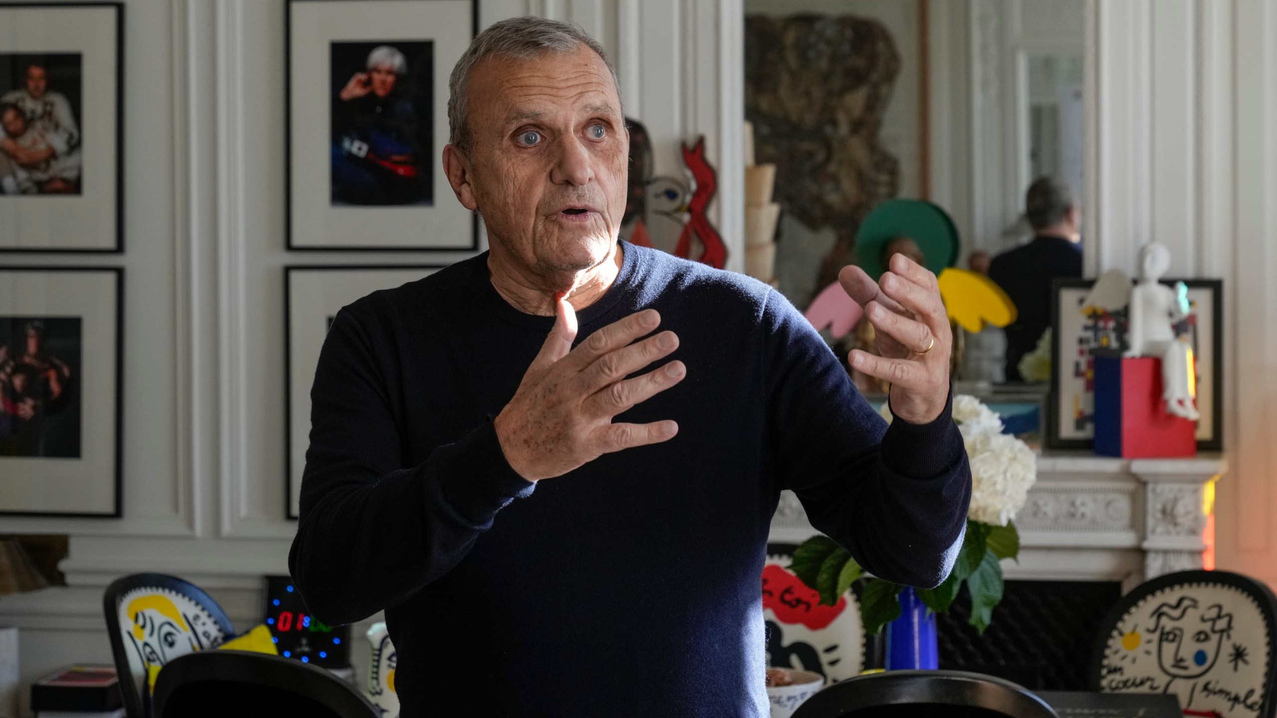 Designer Jean-Charles de Castelbajac gestures as he speaks during an interview with the Associated Press Wednesday, Nov. 20, 2024 in Paris. (AP Photo/Michel Euler)