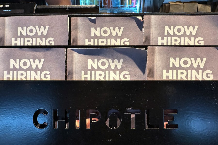 FILE - Hiring signs are displayed at a restaurant in Buffalo Grove, Ill., on Nov. 3, 2024. (AP Photo/Nam Y. Huh, File)