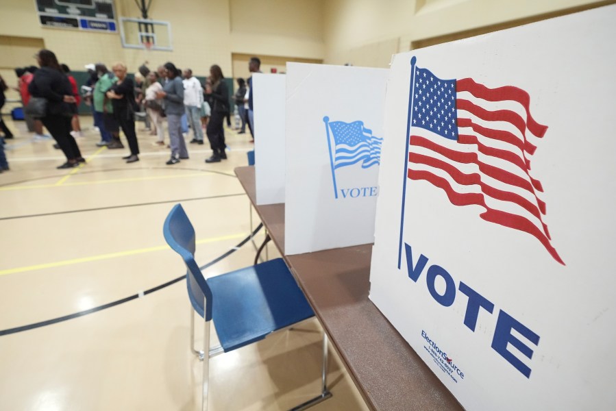 Early morning voters line up to cast their ballots on Election Day, Tuesday, Nov. 5, 2024, at a North Jackson, Miss., precinct. (AP Rogelio V. Solis)