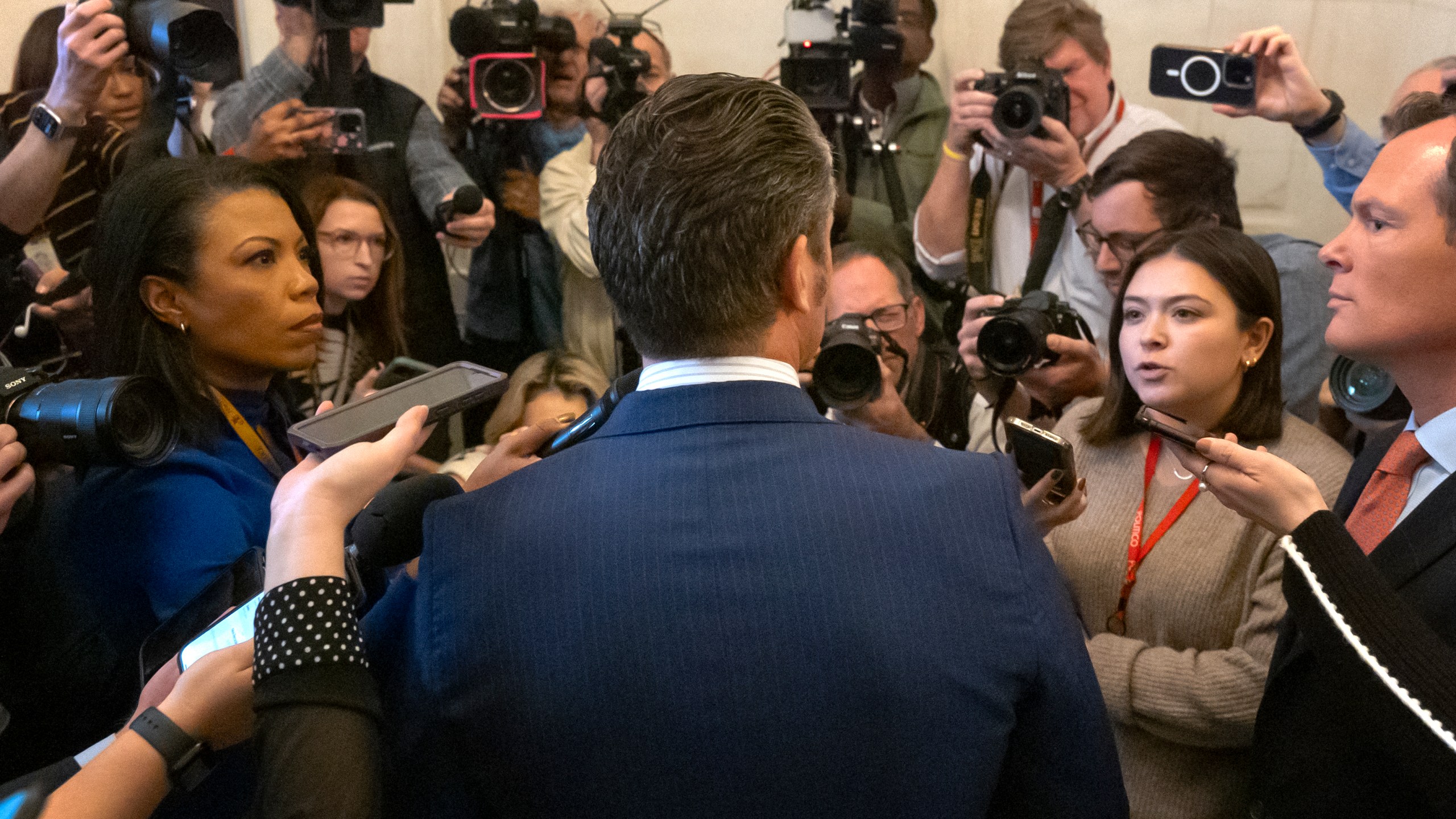 Pete Hegseth, President-elect Donald Trump's pick for Secretary of Defense, speaks with reporters after meeting with senators on Capitol Hill, Thursday, Nov. 21, 2024, in Washington. (AP Photo/Mark Schiefelbein)