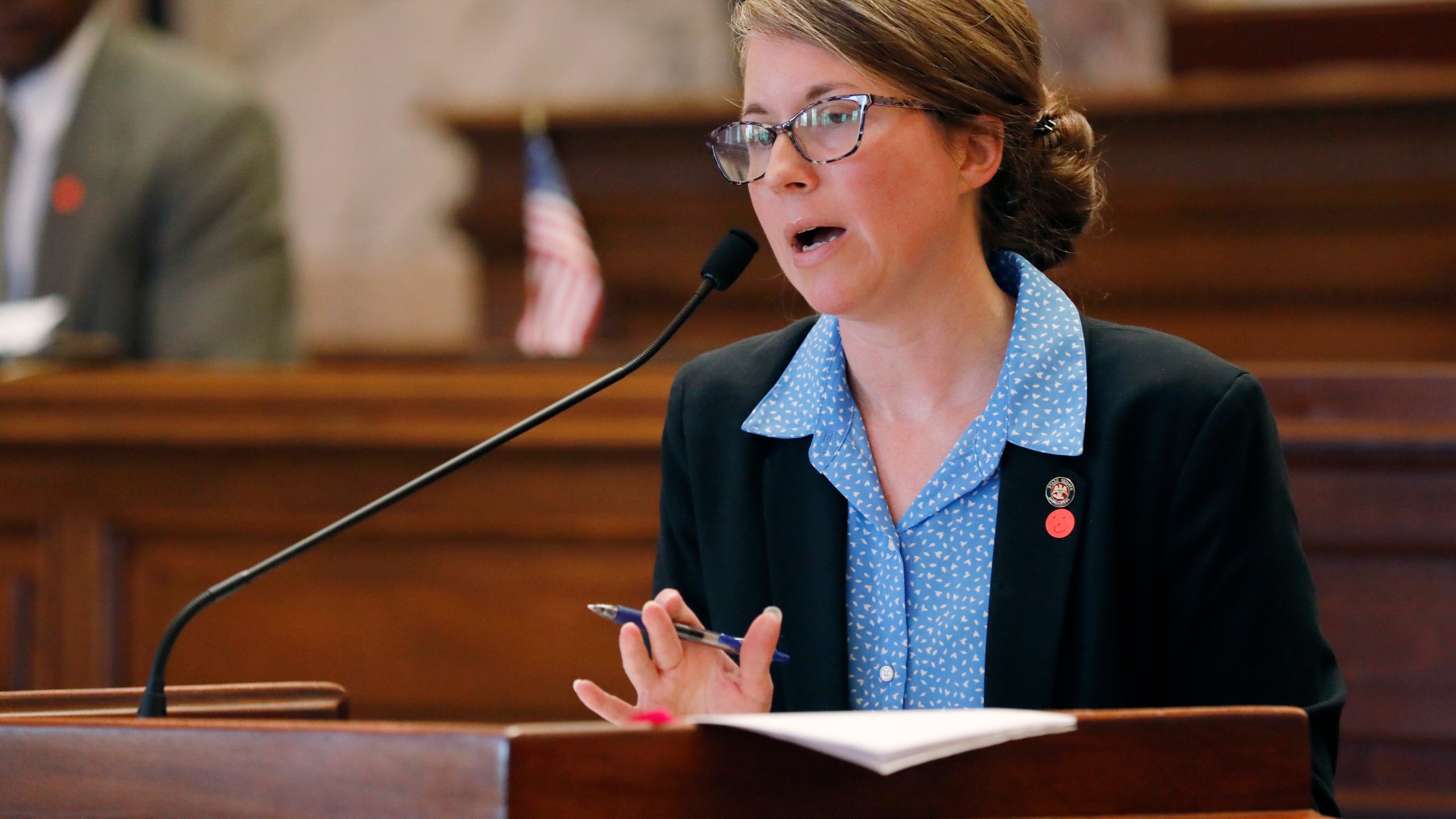 FILE - Senate Elections Committee Chair Jenifer Branning, R-Philadelphia, explains a facet of an absentee-ballot bill during floor debate at the Capitol in Jackson, Miss., June 15, 2020. (AP Photo/Rogelio V. Solis, File)