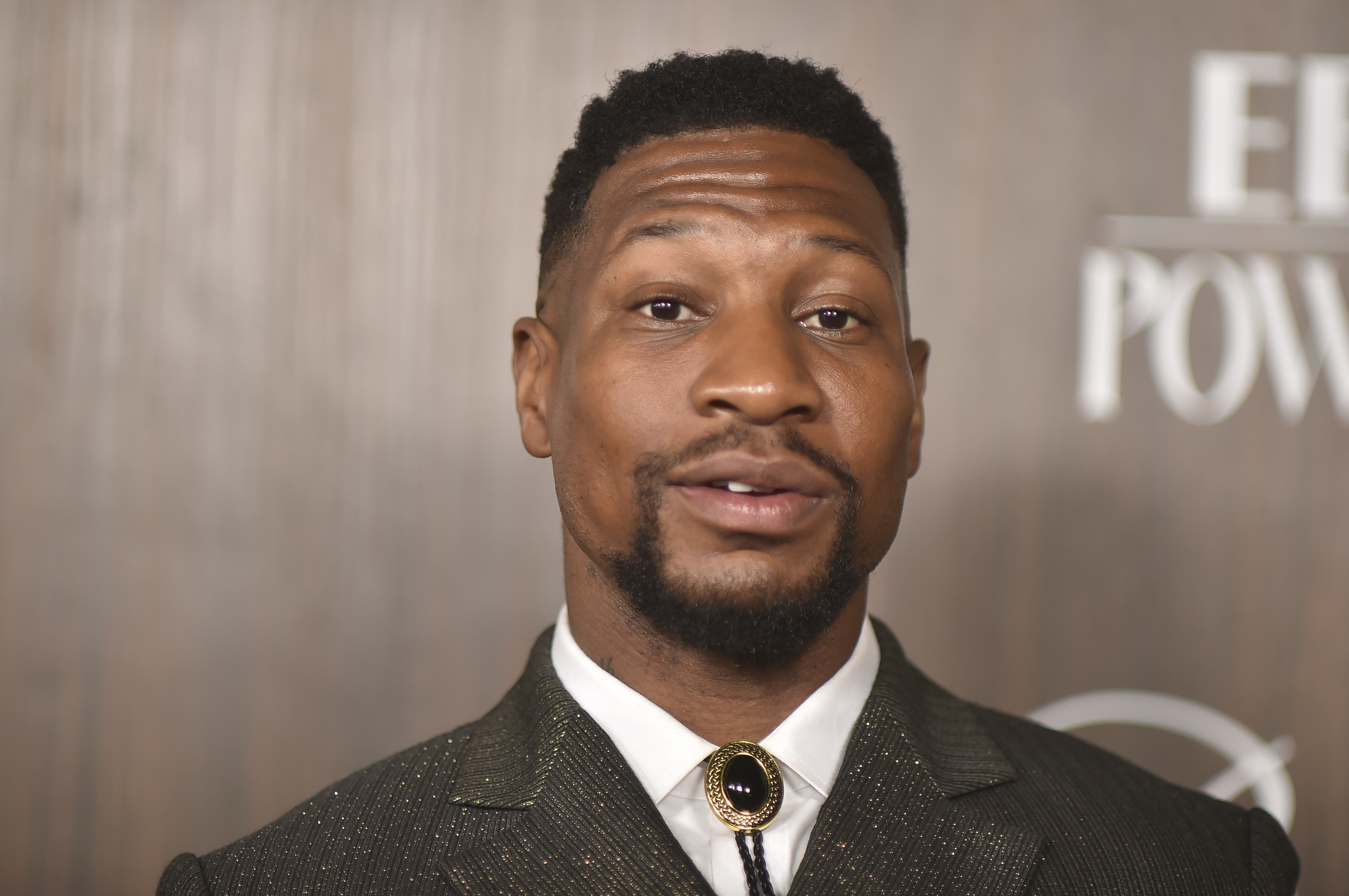 Jonathan Majors arrives at EBONY Power 100 on Sunday, Nov. 17, 2024, at nya studios WEST in Los Angeles. (Photo by Richard Shotwell/Invision/AP)