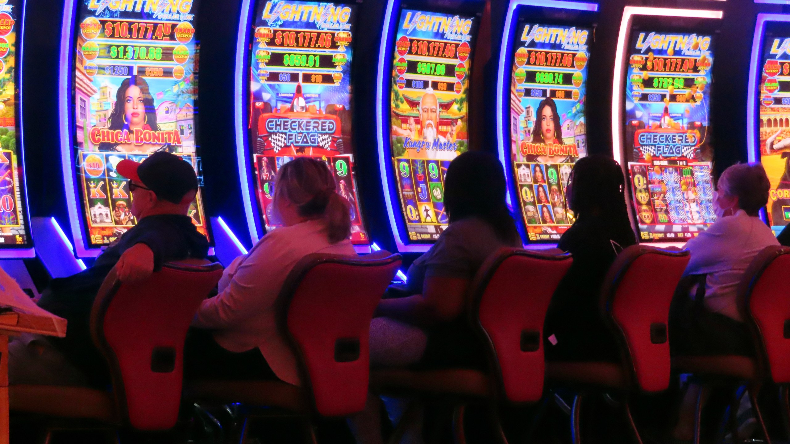 Gamblers play slot machines at the Hard Rock casino in Atlantic City, N.J., on Oct. 3, 2024. (AP Photo/Wayne Parry)