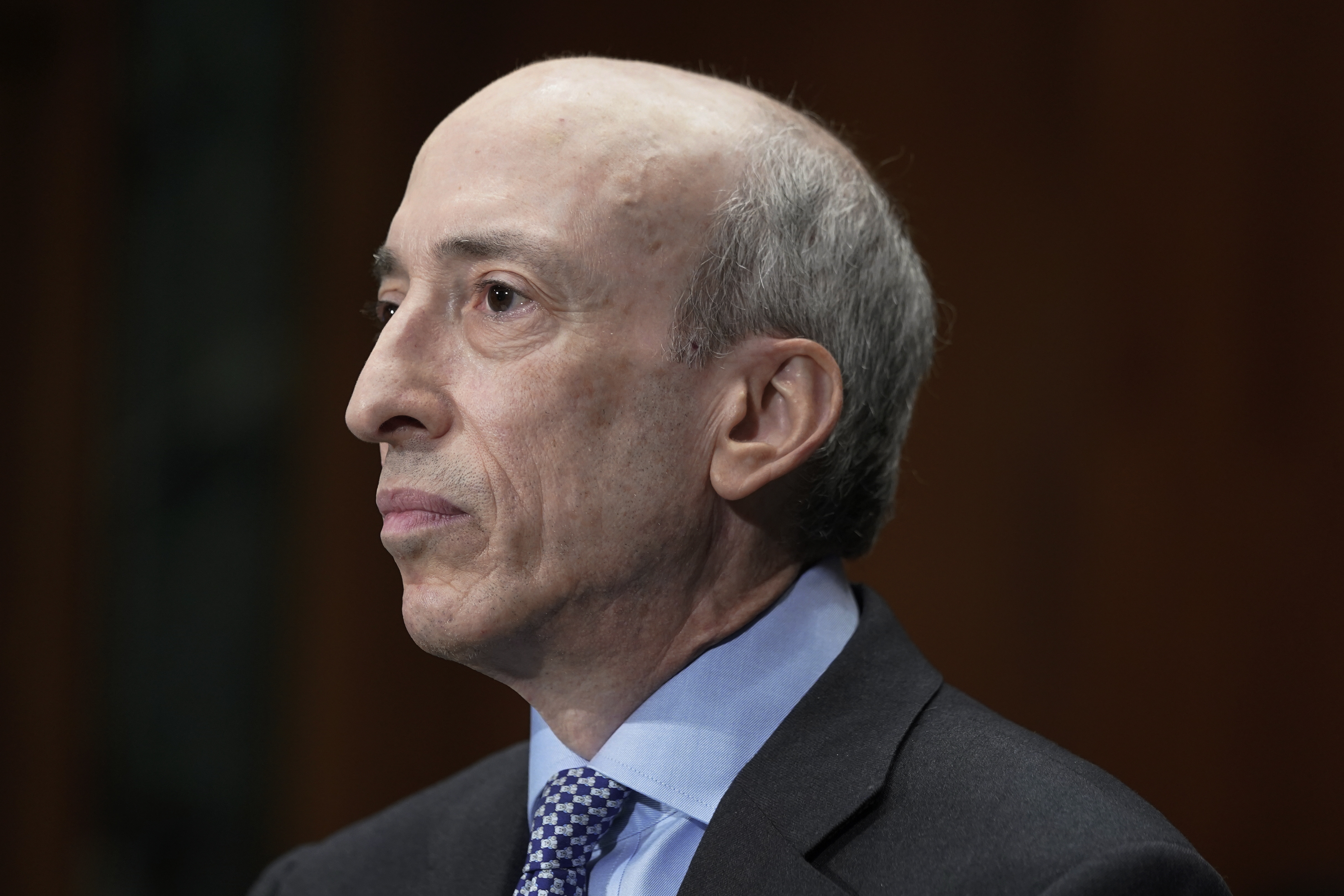 FILE - Securities and Exchange Commission Chair Gary Gensler listens during a Senate Banking Committee Hybrid hearing on 'Oversight of the U.S. Securities and Exchange Commission," on Sept. 12, 2023, on Capitol Hill in Washington. (AP Photo/Mariam Zuhaib, File)