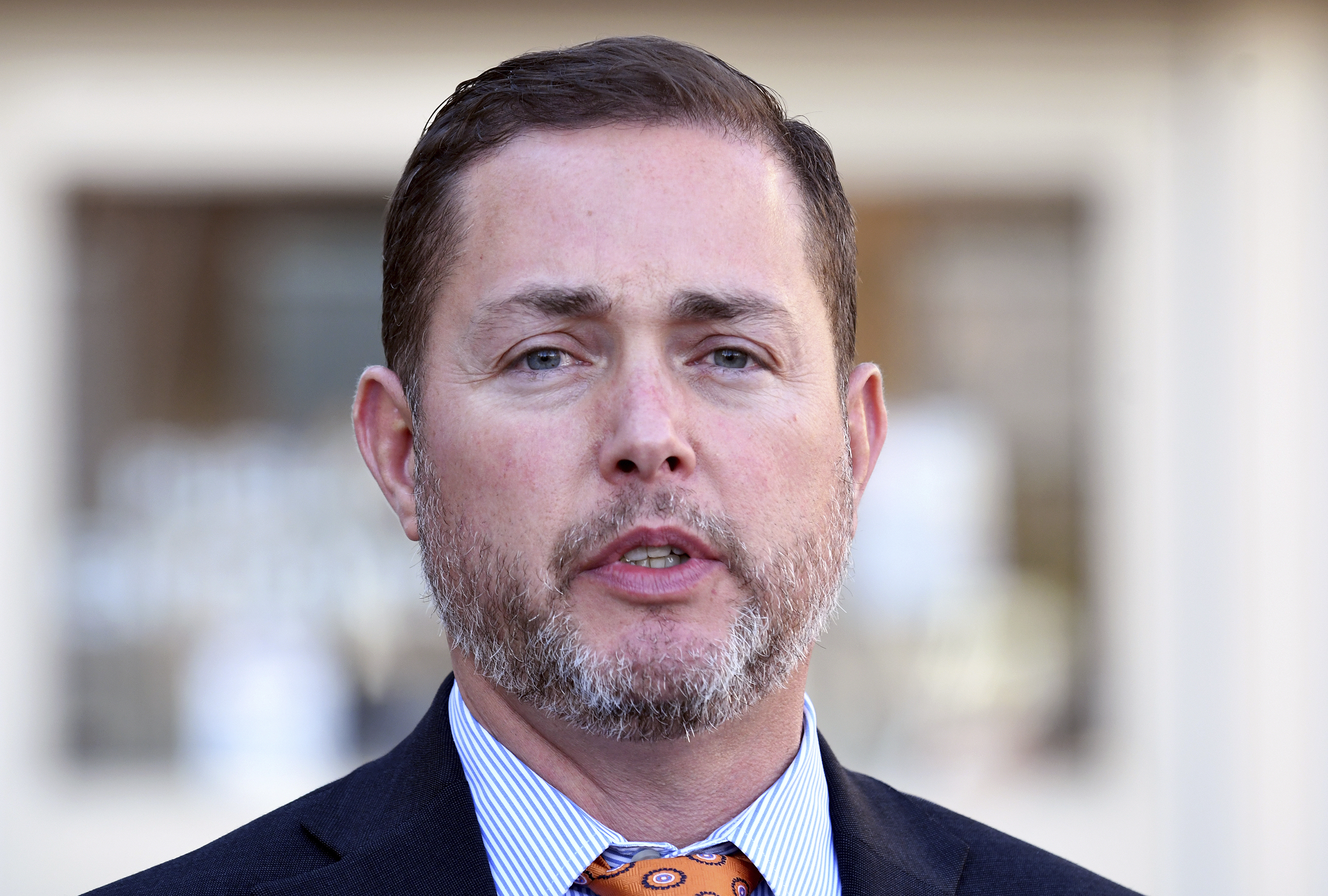 District Attorney Michael Allen speaks during a news conference after owners of a Colorado funeral home who let nearly 190 bodies decay pleaded guilty to corpse abuse in Colorado Springs, Colo., on Friday, Nov. 22, 2024. (AP Photo/Thomas Peipert)