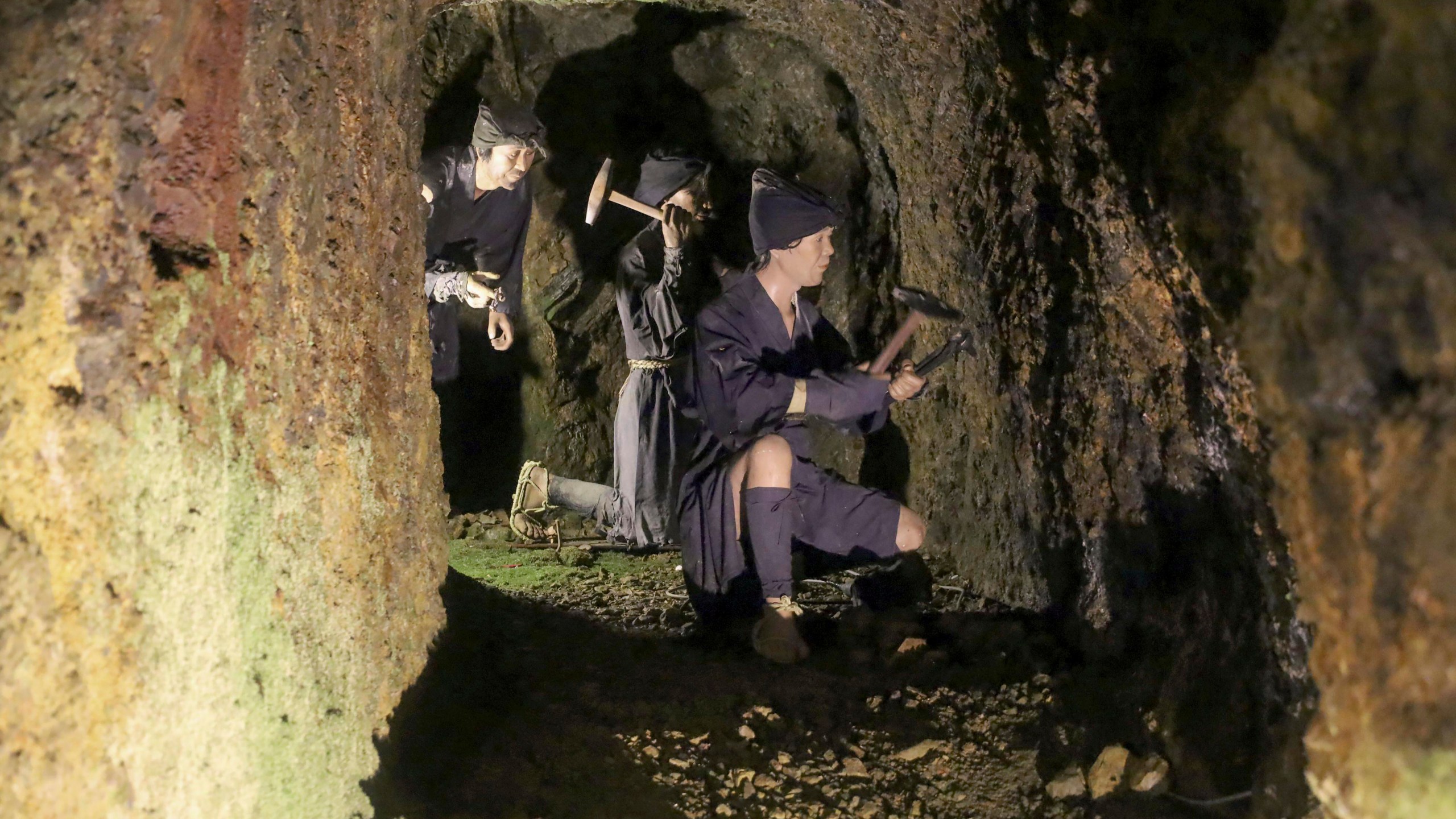 Mannequins enacting a mining scene are seen inside remains of the Sado gold mine on Sado Island, northern Japan, on July 4, 2024. (Atsushi Watanabe/Kyodo News via AP)