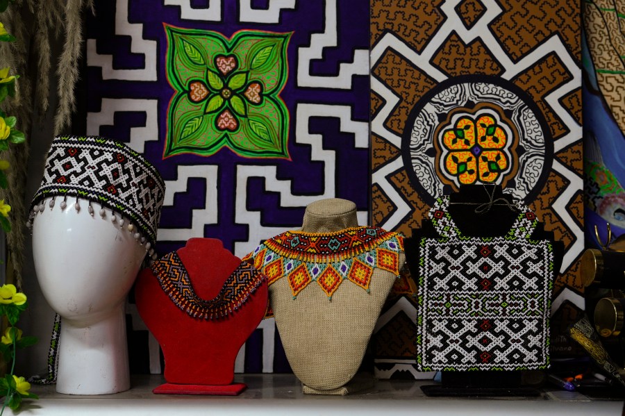 Crafts made by Sadith Silvano sit at her home and workshop in Lima, Peru, Saturday, Oct. 19, 2024. “Every design tells a story,” said Silvano, from Paoyhan, a Shipibo-Konibo Indigenous community in the Amazon. (AP Photo/Guadalupe Pardo)