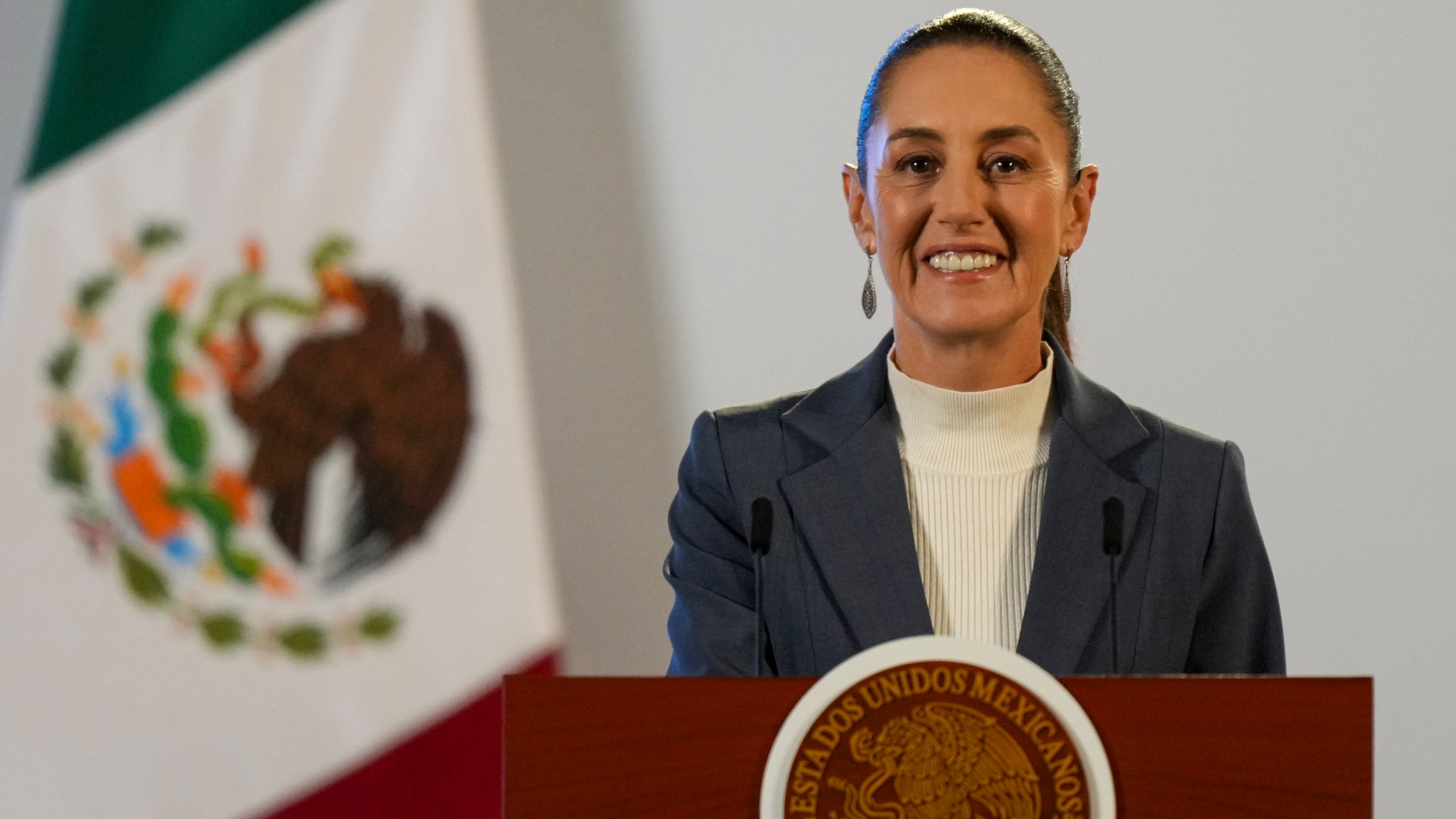 FILE - Mexican President Claudia Sheinbaum gives a media briefing from the National Palace in Mexico City, Oct. 2, 2024, the morning after her inauguration. (AP Photo/Fernando Llano, File)