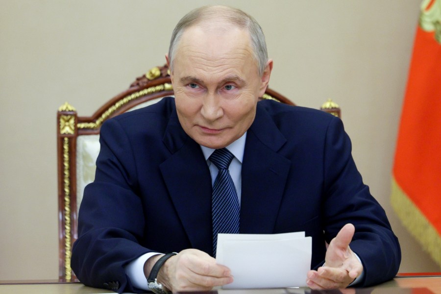 Russian President Vladimir Putin speaks during a meeting with the leadership of the Russian Ministry of Defense, representatives of the military-industrial complex and developers of missile systems at the Kremlin in Moscow, Russia, Friday, Nov. 22, 2024. (Gavriil Grigorov/Sputnik, Kremlin Pool Photo via AP)