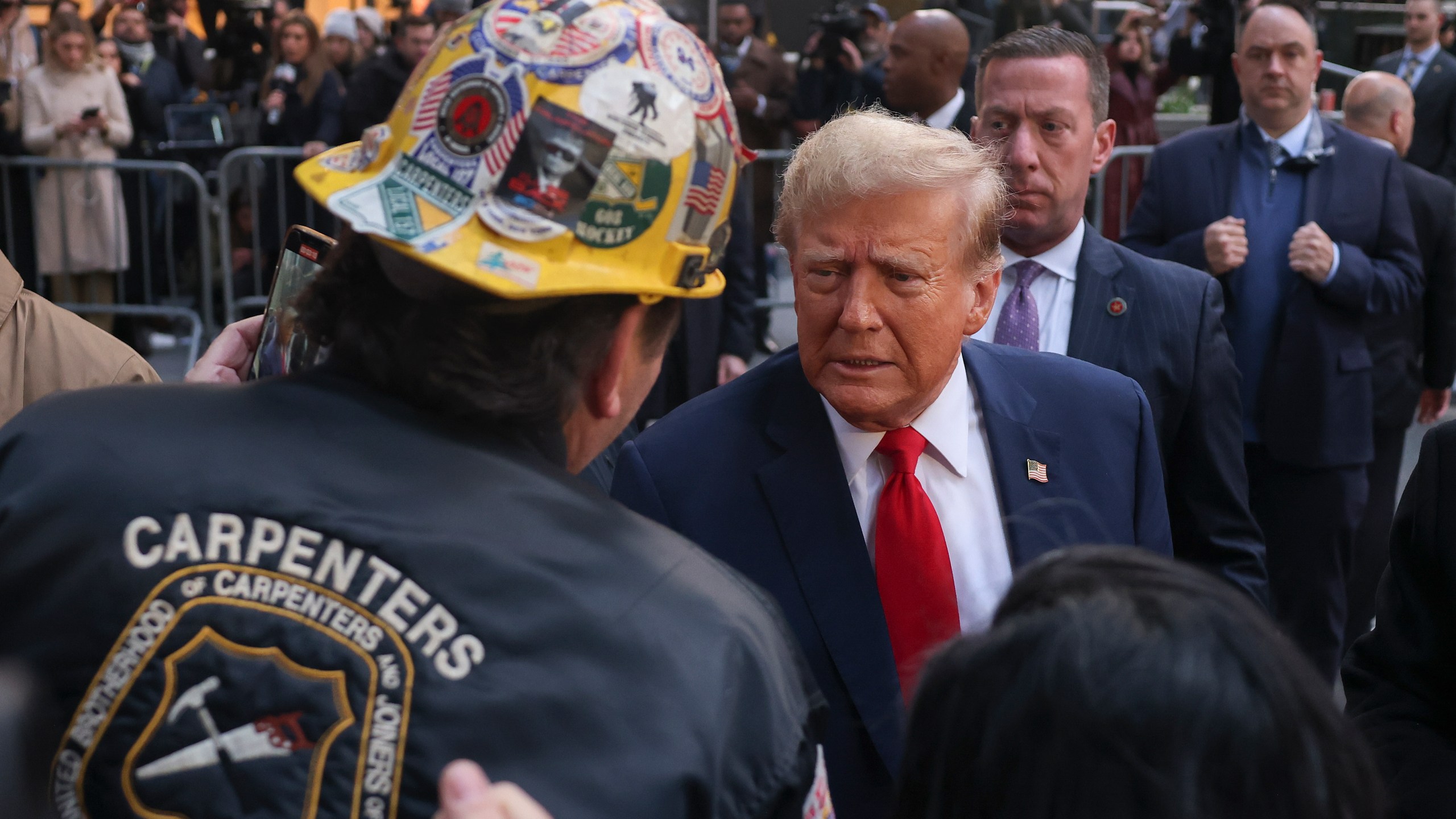 FILE - Former President Donald Trump speaks with construction workers in midtown Manhattan, April 25, 2024, in New York. (AP Photo/Yuki Iwamura, File)