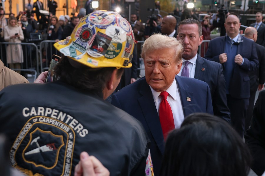 FILE - Former President Donald Trump speaks with construction workers in midtown Manhattan, April 25, 2024, in New York. (AP Photo/Yuki Iwamura, File)