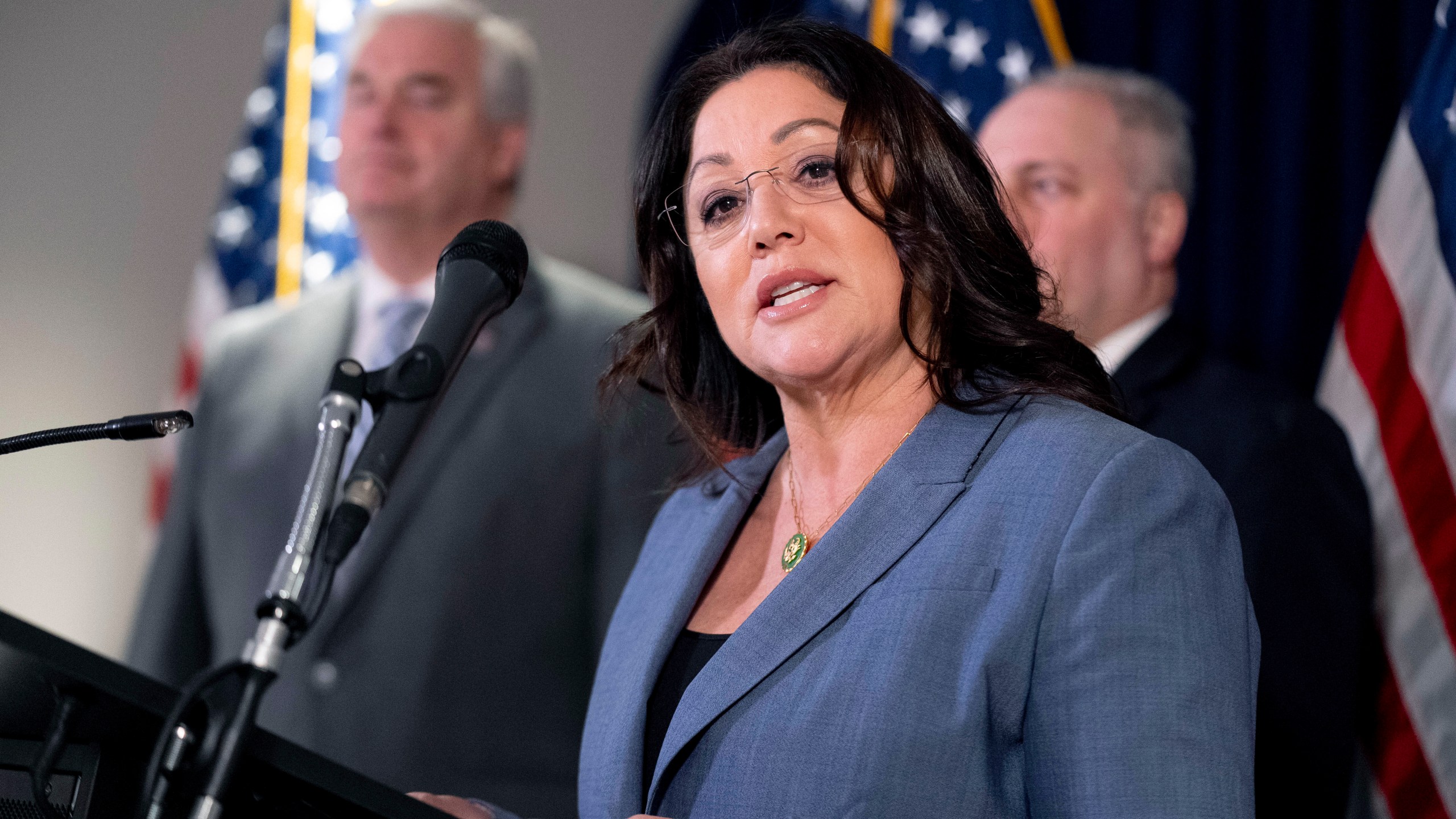 FILE - Rep. Lori Chavez-DeRemer, R-Ore., accompanied by Majority Whip Rep. Tom Emmer, R-Minn., left, and House Majority Leader Rep. Steve Scalise, R-La., right, speaks at a news conference on Capitol Hill in Washington, Jan. 25, 2023. (AP Photo/Andrew Harnik, File)