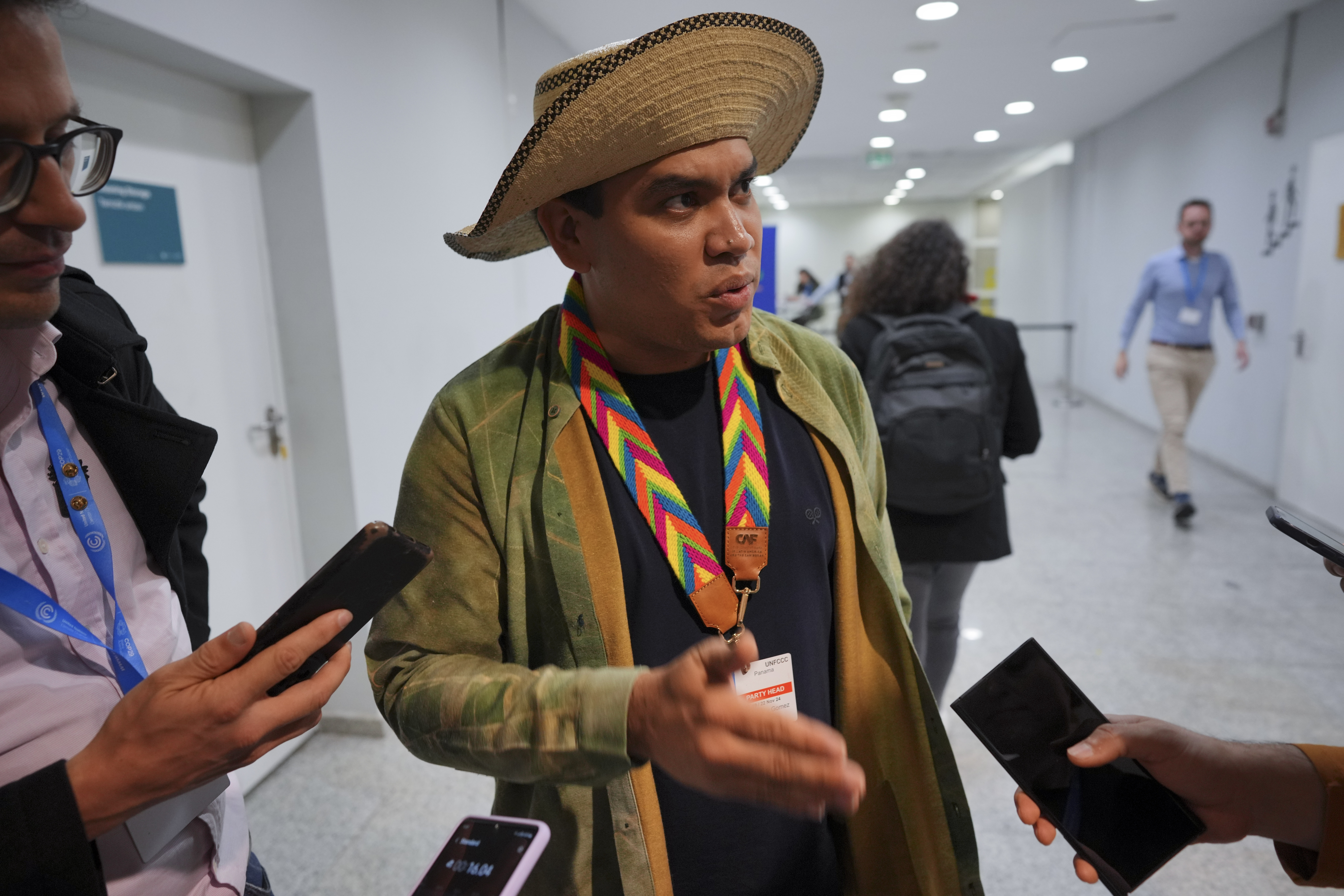 Panama Climate Envoy Juan Carlos Monterrey Gomez speaks to members of the media at the COP29 U.N. Climate Summit, Saturday, Nov. 23, 2024, in Baku, Azerbaijan. (AP Photo/Peter Dejong)