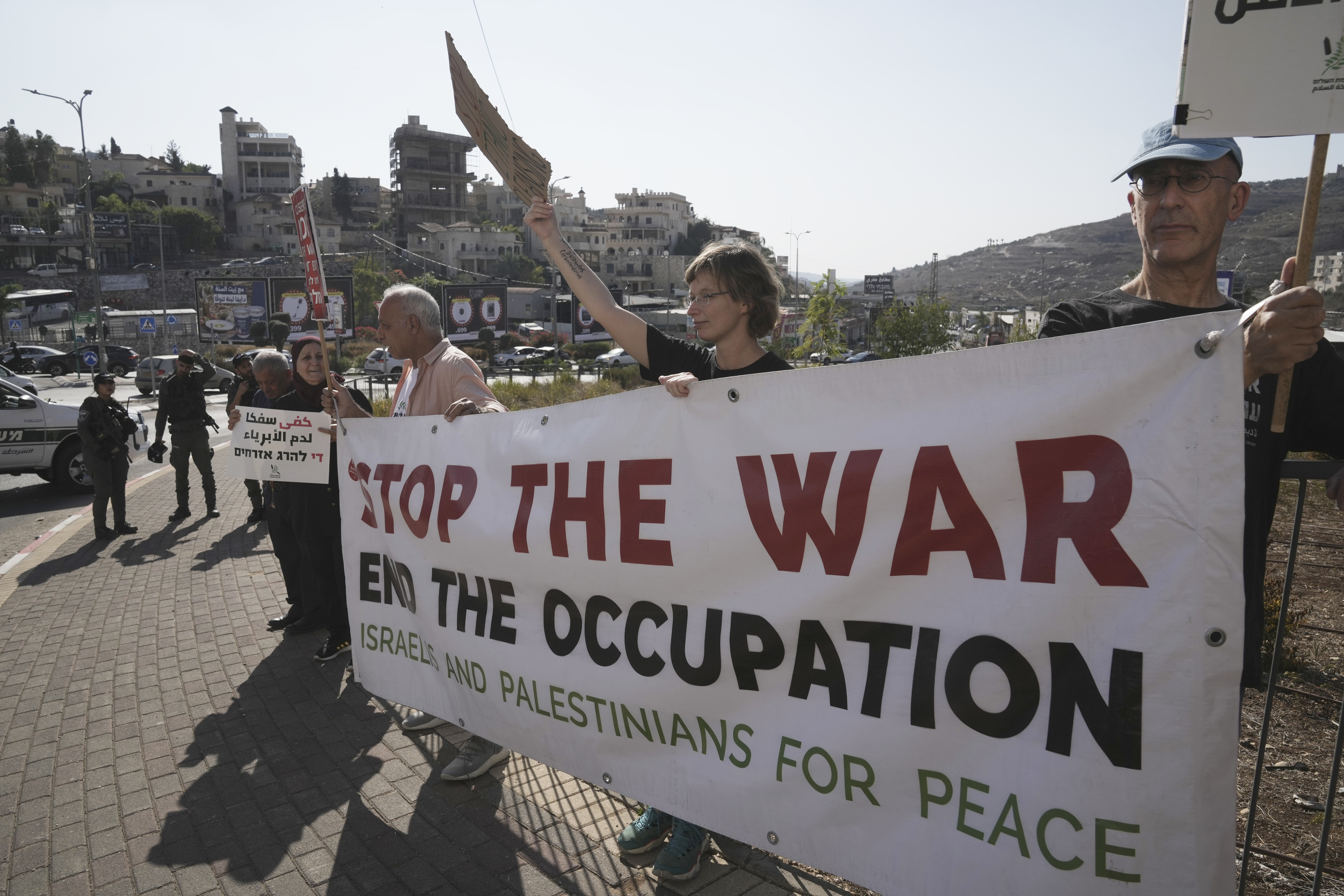 Israelis and Palestinian citizens of Israel protest Israel's military operations in the Gaza Strip, in Umm al-Fahm, Israel, Friday, Nov. 15, 2024. (AP Photo/Mahmoud Illean)