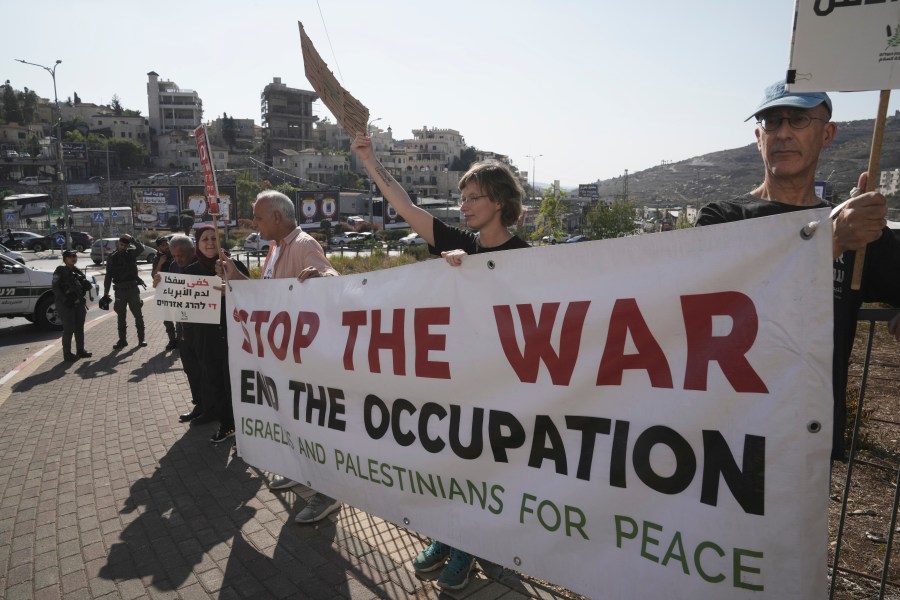 Israelis and Palestinian citizens of Israel protest Israel's military operations in the Gaza Strip, in Umm al-Fahm, Israel, Friday, Nov. 15, 2024. (AP Photo/Mahmoud Illean)