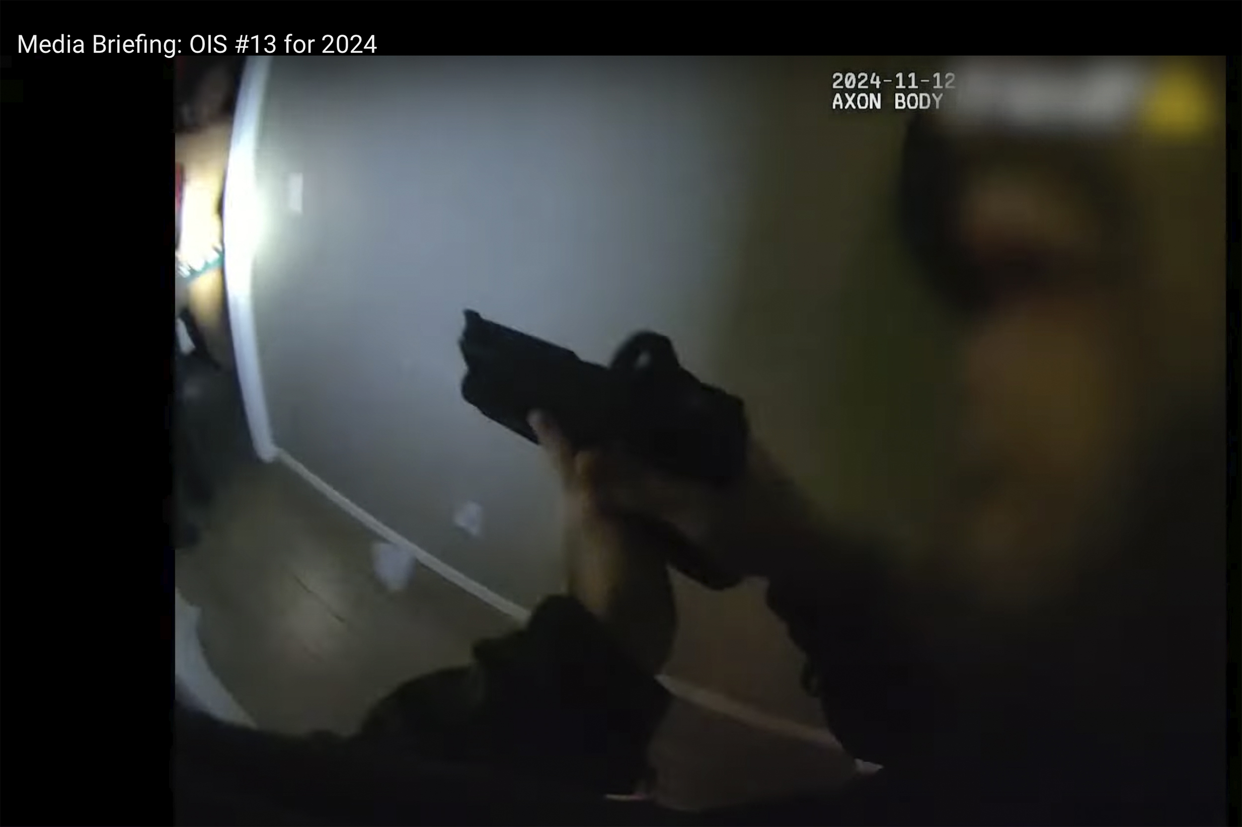 This police body camera image provided by Las Vegas Metropolitan Police shows police responding to a home invasion on Nov. 12, 2024 in Las Vegas. (Las Vegas Metropolitan Police via AP)