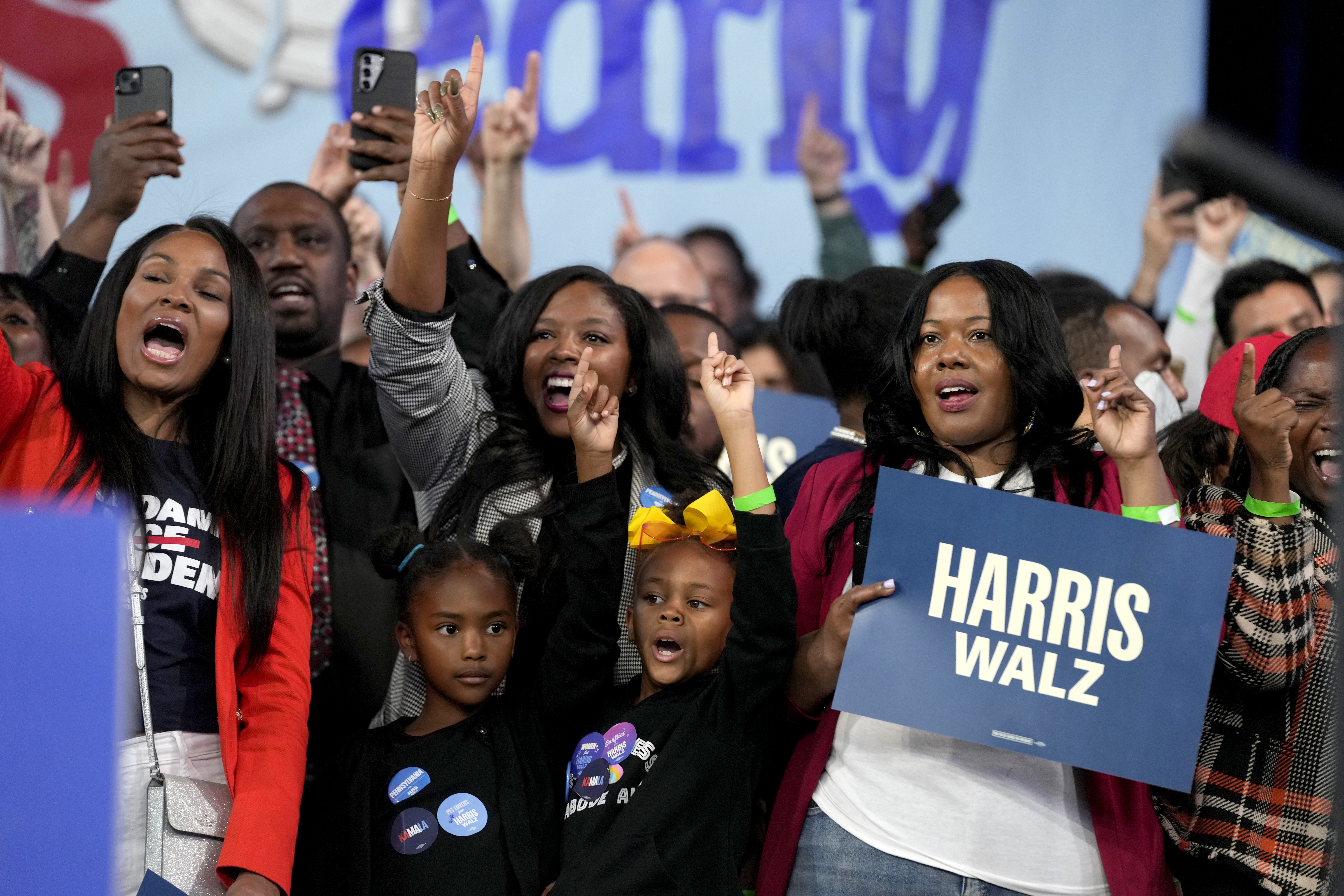 FILE - Supporters cheer during a community rally with Democratic presidential nominee Vice President Kamala Harris, Oct. 27, 2024, in Philadelphia. (AP Photo/Susan Walsh, File)