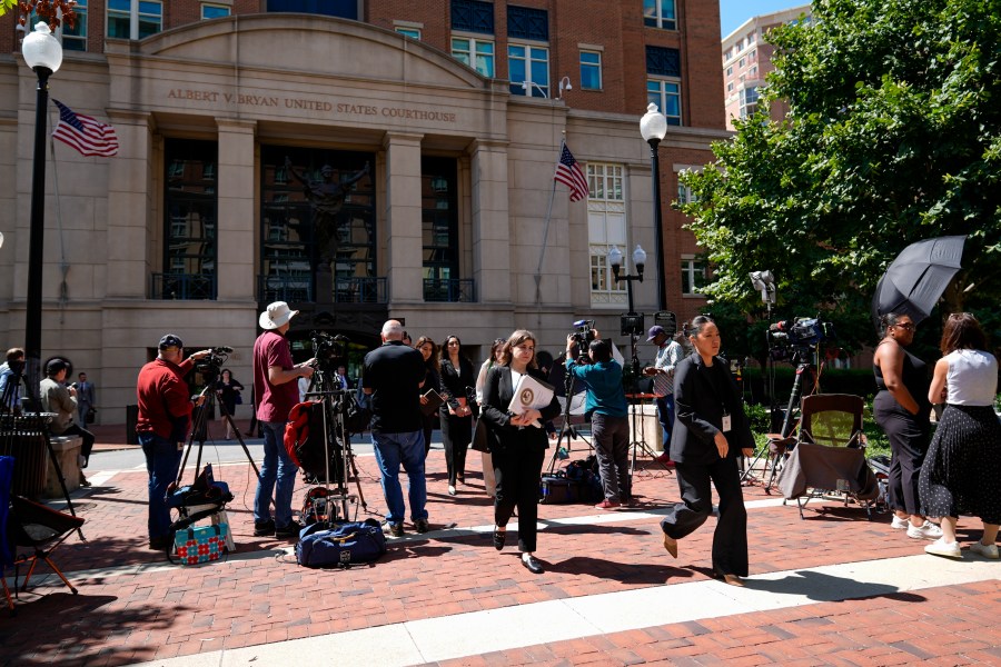 FILE - Lawyers and legal assistants leave the U.S. District Court for the Eastern District of Virginia for a lunch break in the Department of Justice's antitrust trial against tech giant Google, Sept. 9, 2024, in Alexandria, Va. (AP Photo/Stephanie Scarbrough, File)