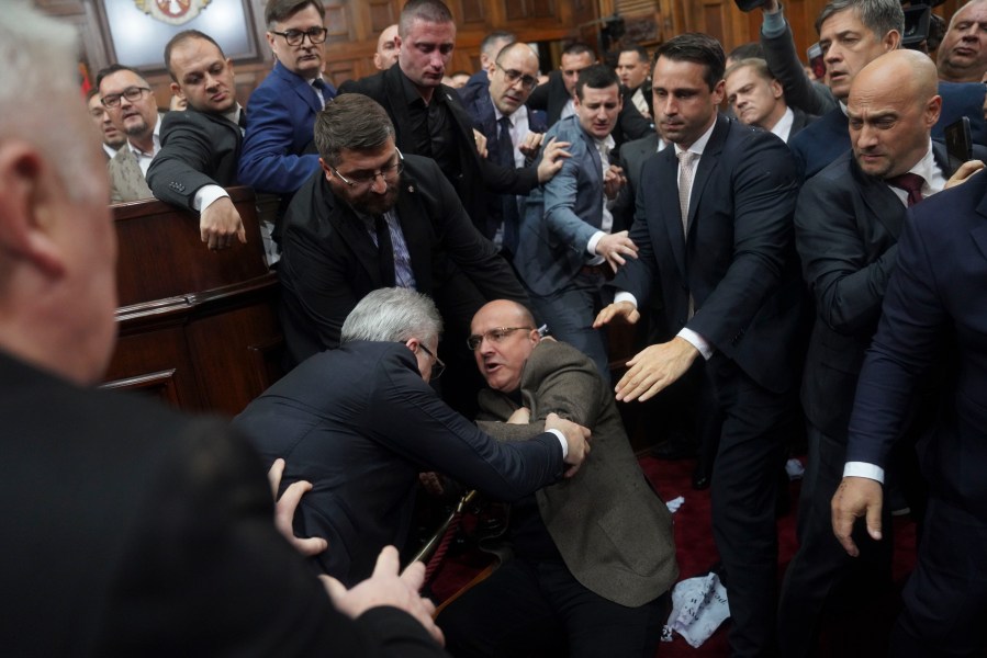 Ruling party lawmakers, opposition members, and some ministers fight during a Serbia's parliament session, which was scheduled to debate the 2025 budget, in Belgrade, Serbia, Monday, Nov. 25, 2024. (AP Photo)