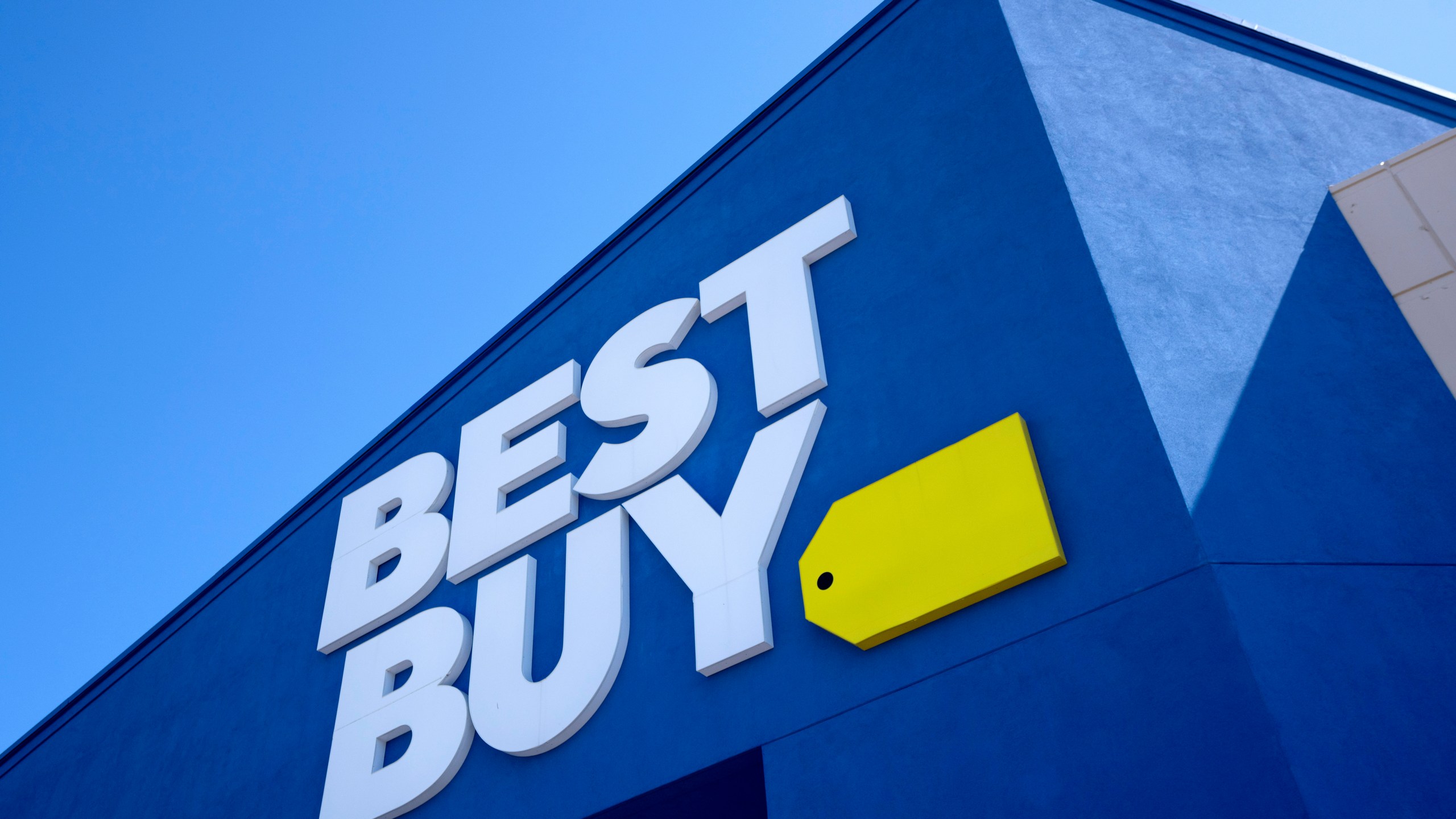 FILE - A Best Buy logo is shown at a store in Dallas on Oct. 25, 2024. (AP Photo/Tony Gutierrez, File)