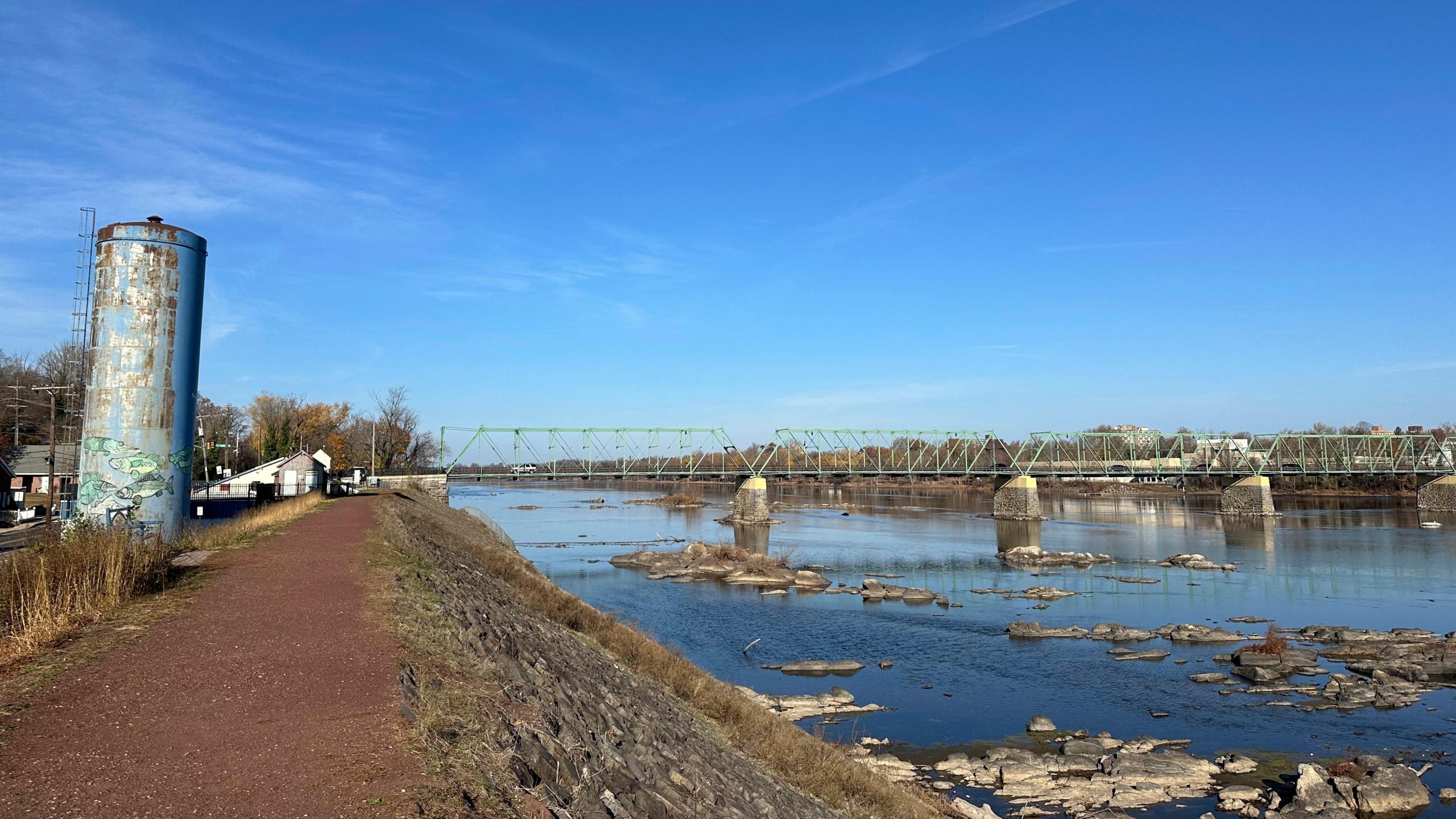 The Delaware River overlooking Trenton, N.J. flows downstream as seen from from Morrisville, Pa., on Monday, Nov. 25, 2024. (AP Photo/Mike Catalini)