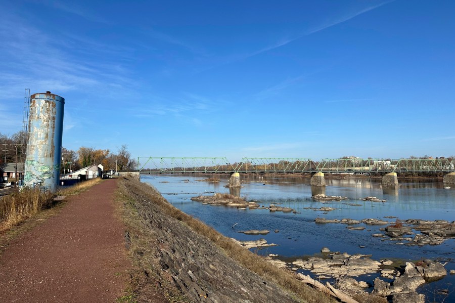 The Delaware River overlooking Trenton, N.J. flows downstream as seen from from Morrisville, Pa., on Monday, Nov. 25, 2024. (AP Photo/Mike Catalini)