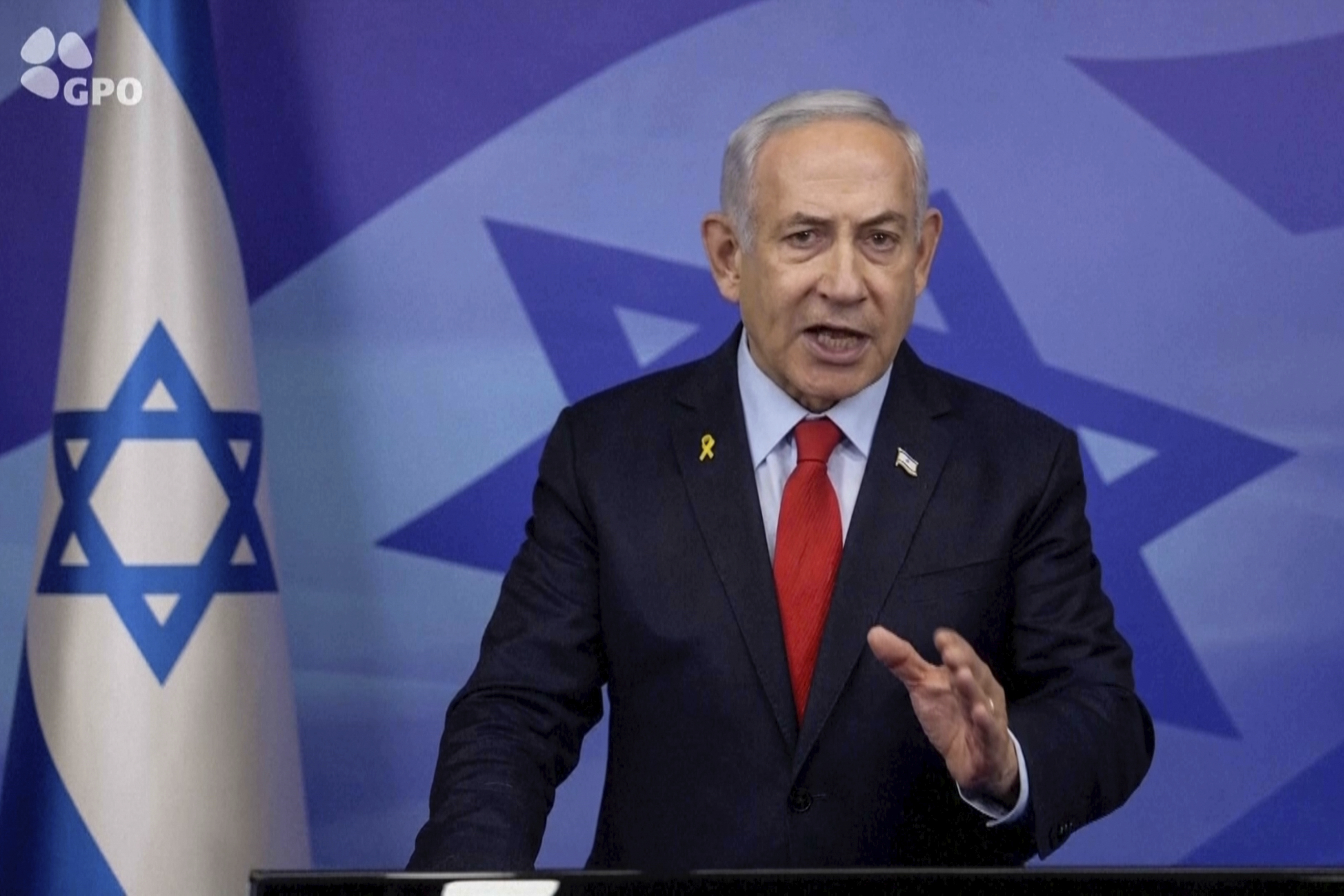 In this screen grab image from video provide by the Israeli Government Press Office, Israeli Prime Minister Benjamin Netanyahu makes a televised statement Tuesday, Nov. 26, 2024, in Jerusalem, Israel. (Israeli Government Press Office via AP)